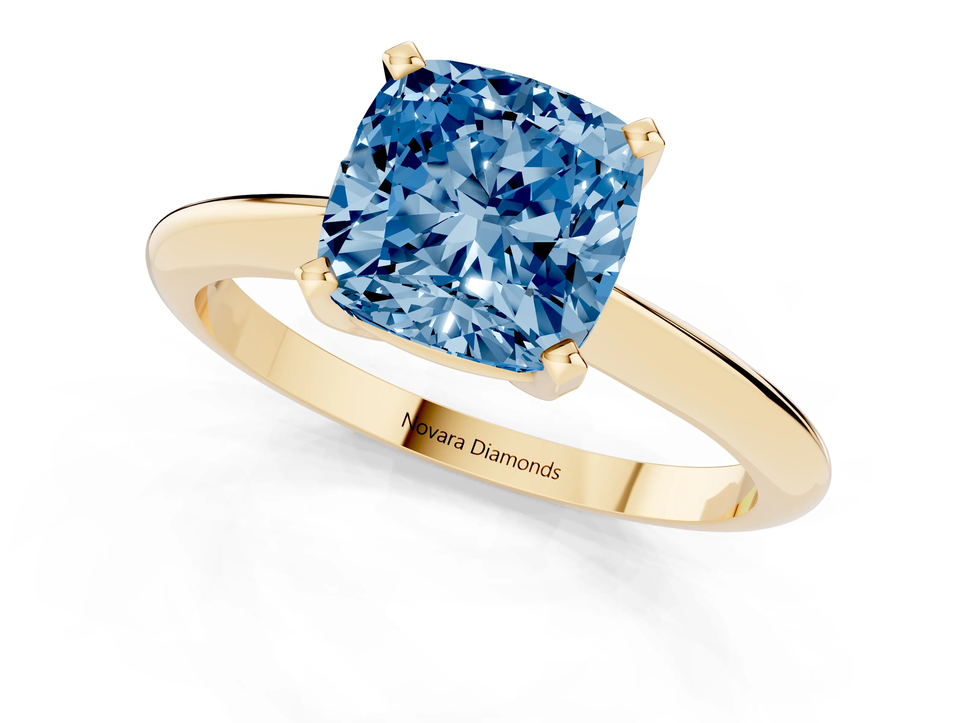 Fancy Blue Cushion Cut Diamond Solitaire Ring Set in Yellow gold with Prong Setting on a Plain Round Band