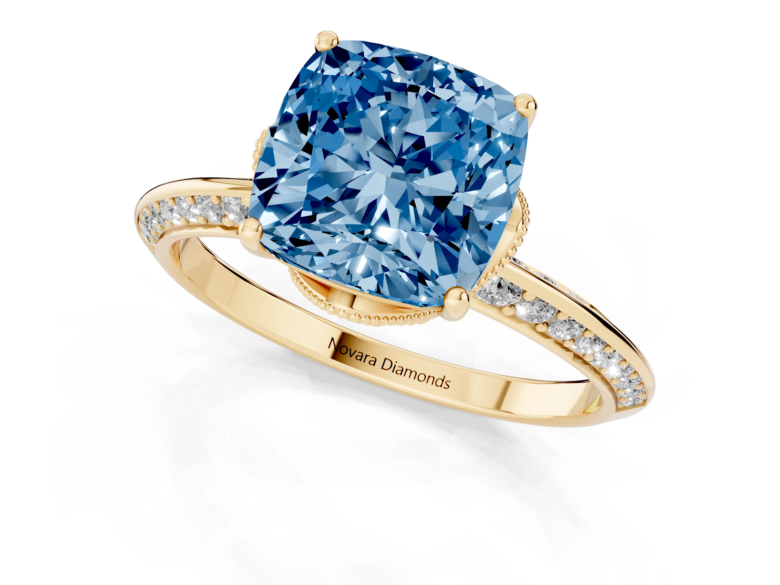 Fancy Blue Cushion Cut Diamond Solitaire Engagement Ring Set in Yellow gold with Pavé Split Shank and Prong Setting