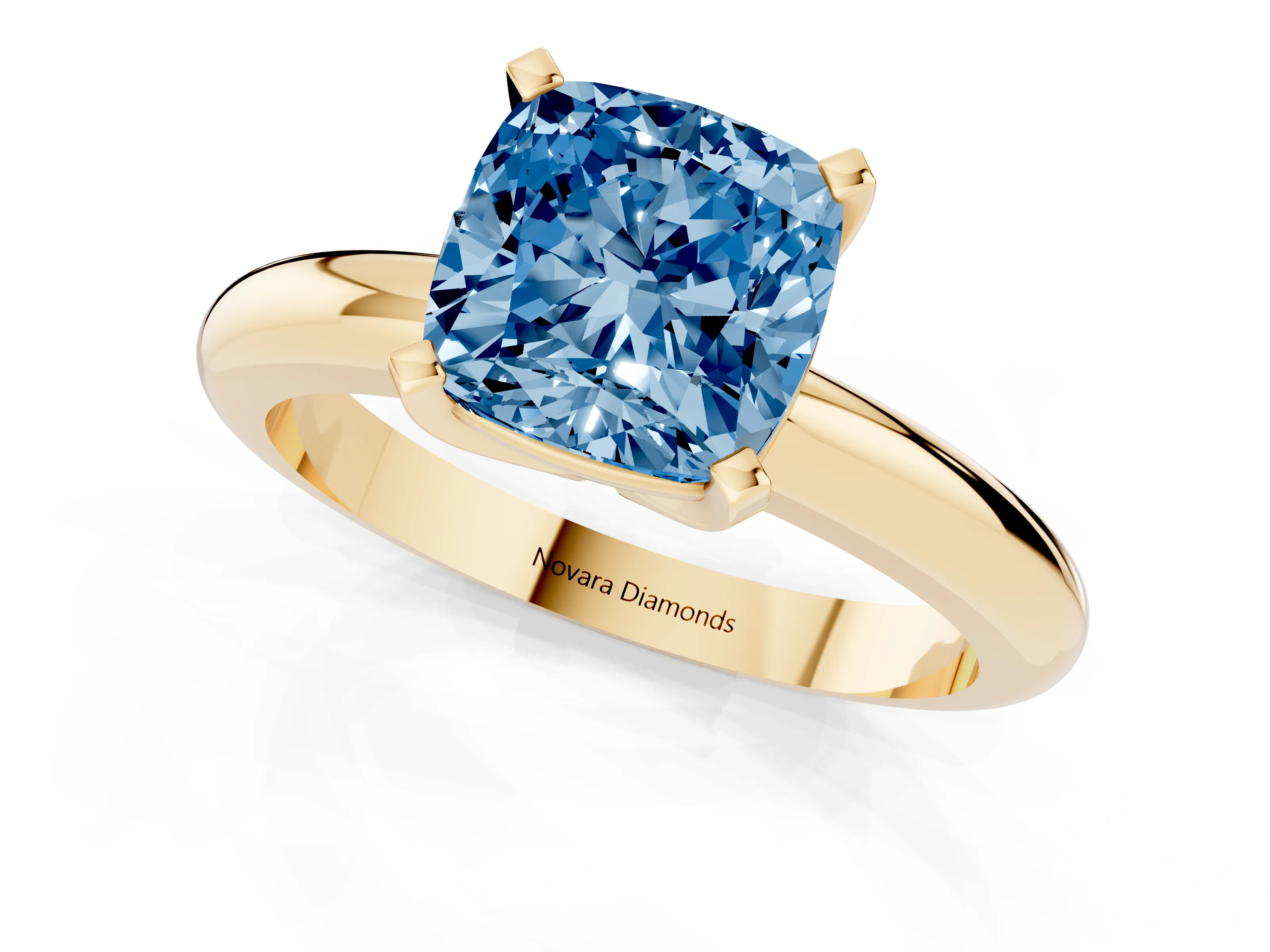 Fancy Blue Cushion Cut Diamond Solitaire Engagement Ring Set in Yellow gold with Round Band and Prong Setting