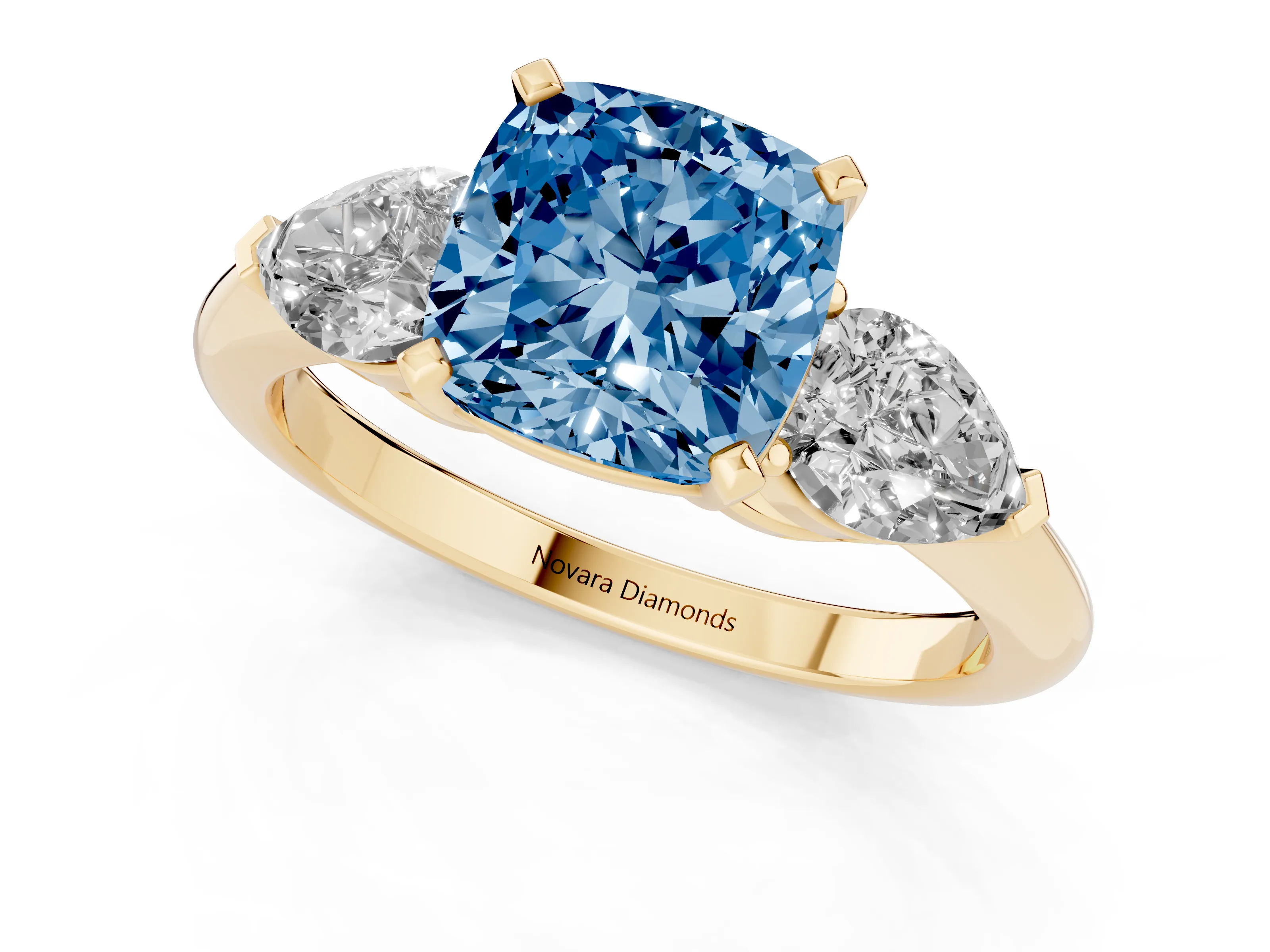 Fancy Blue Three-Stone Cushion Cut Diamond Ring Set in Yellow gold with Pear Side Stones and Prong Setting