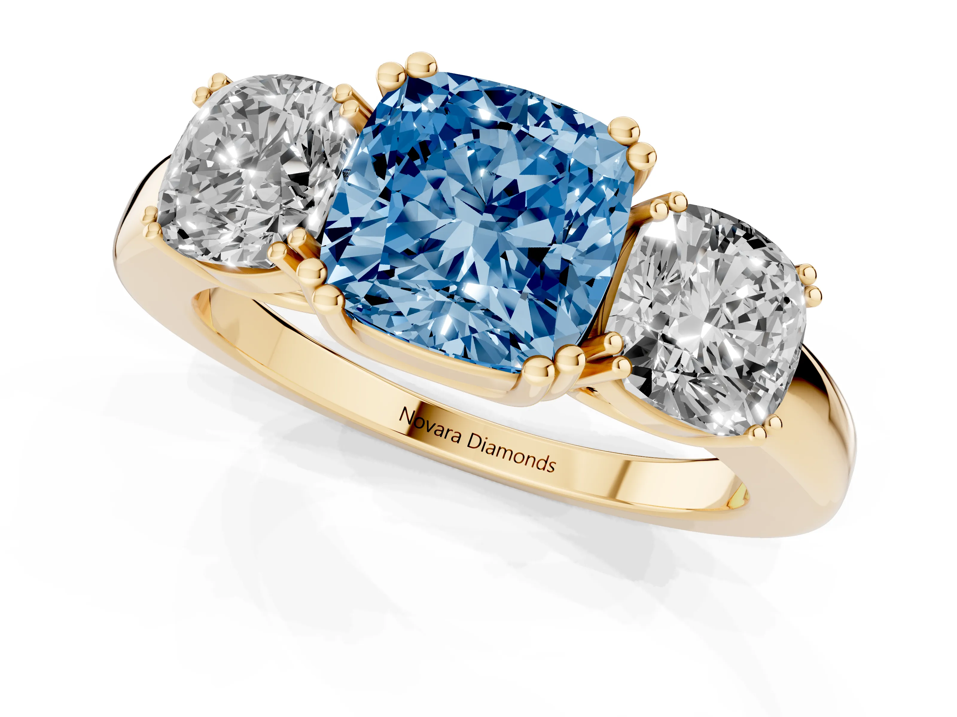 Fancy Blue Cushion Cut Diamond Three-Stone Ring Set in Yellow gold with Polished Band and Prong Setting