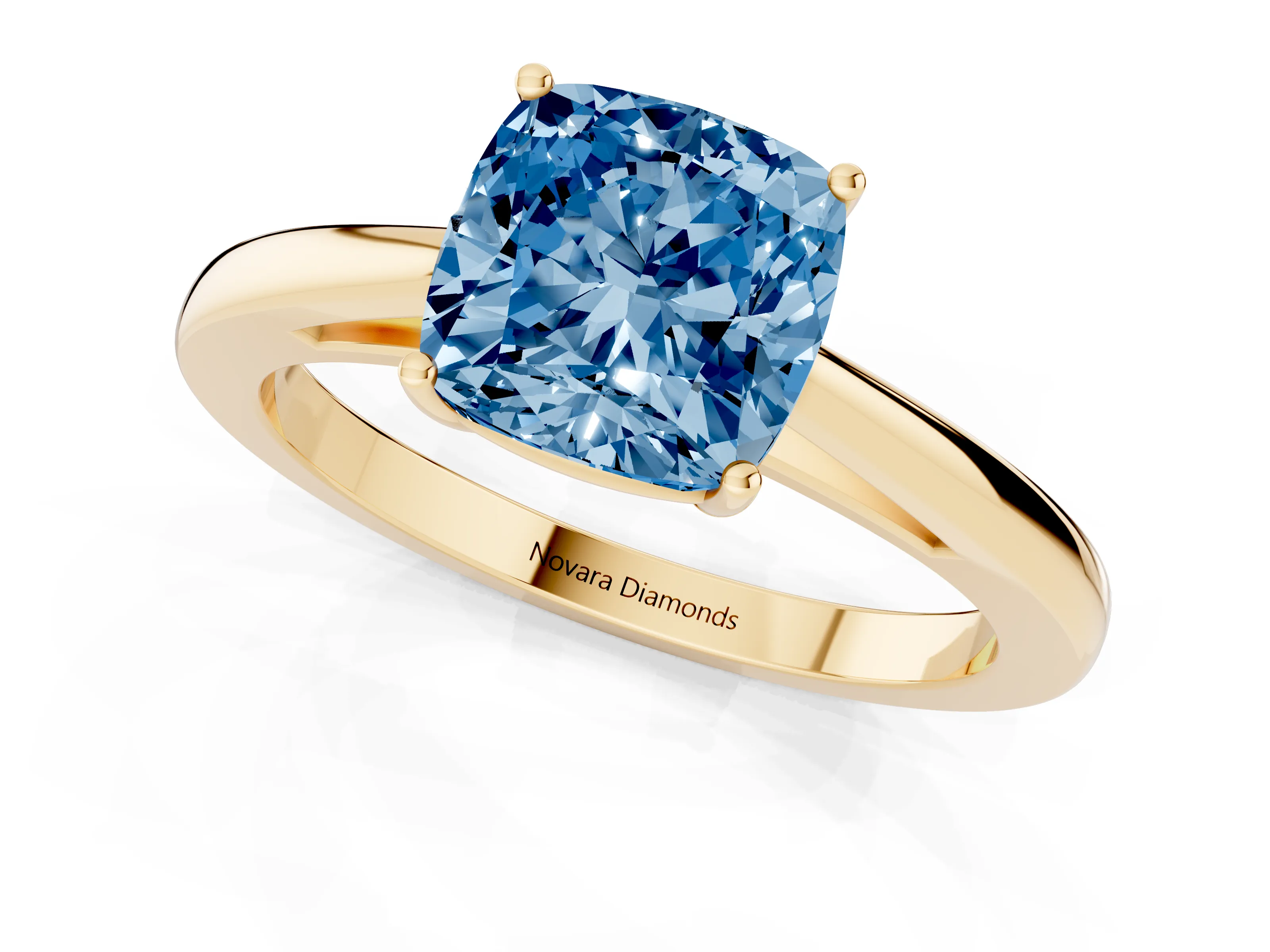 Fancy Blue Cushion Cut Diamond Solitaire Ring Set in Yellow gold with Split Shank and Prong Setting