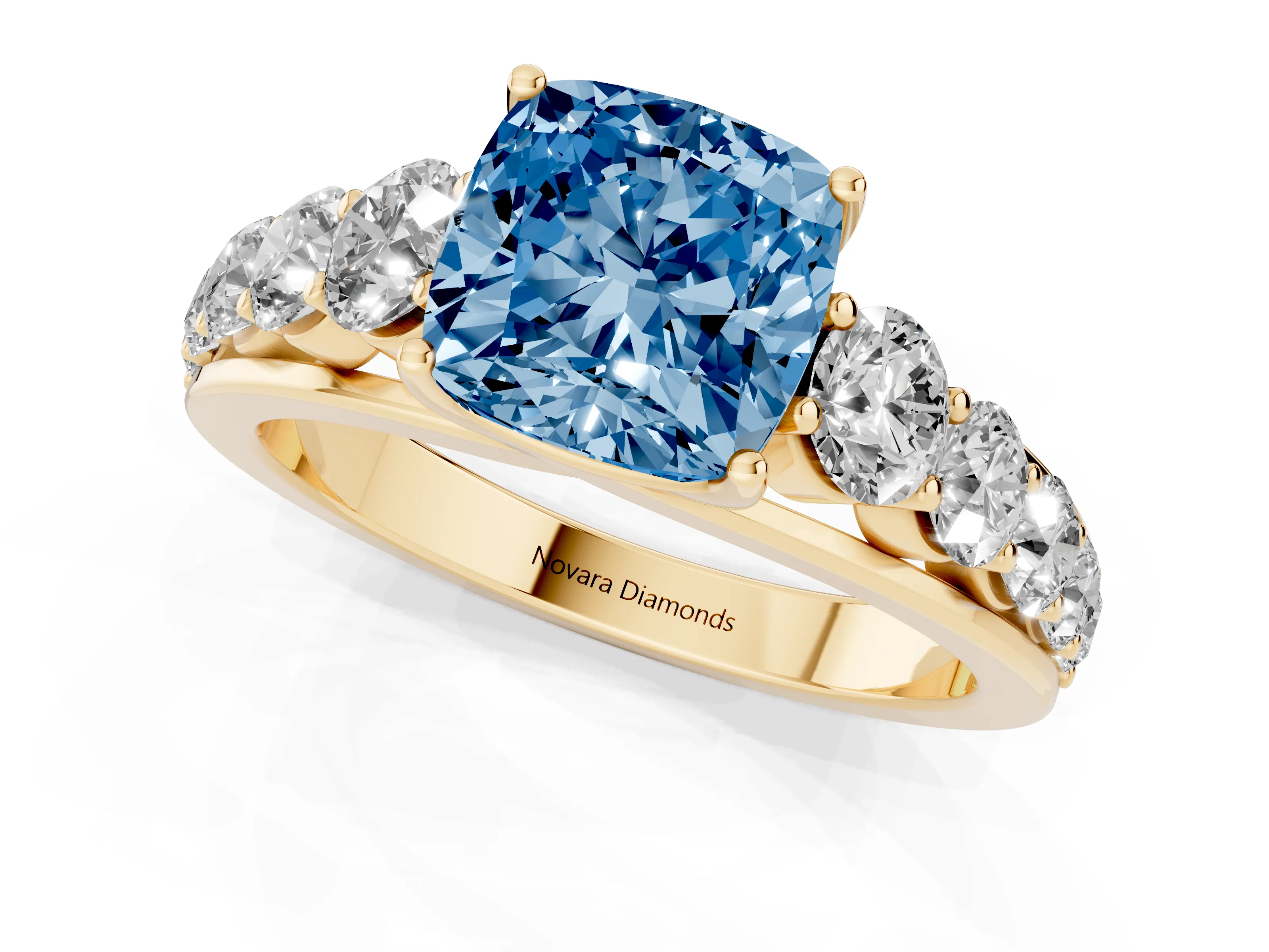 Fancy Blue Cushion Cut Diamond Solitaire Ring Set in Yellow gold with Pavé-Set Band and Prong Setting