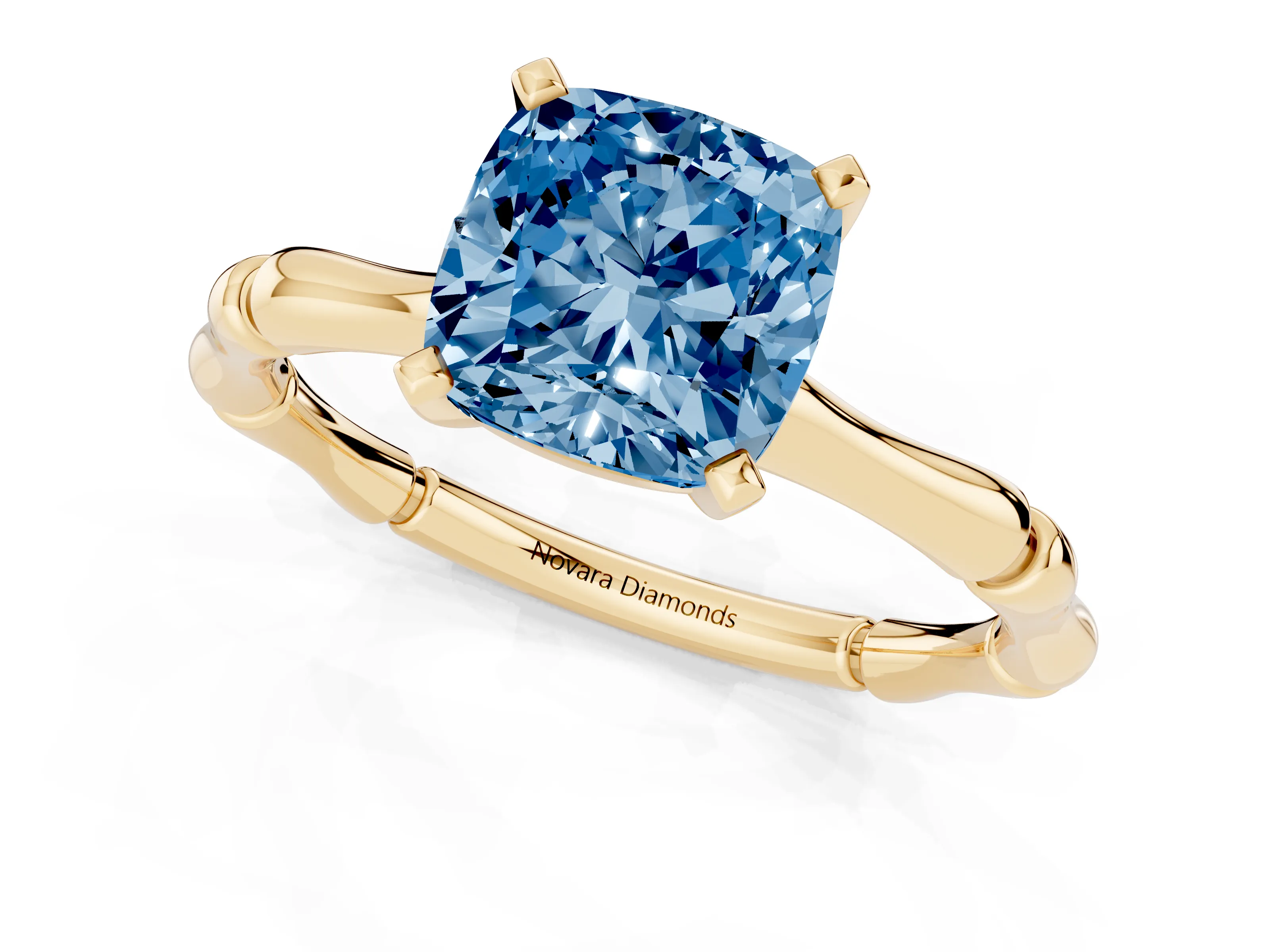 Fancy Blue Cushion Cut Diamond Solitaire Ring Set in Yellow gold with Bamboo Band and Prong Setting