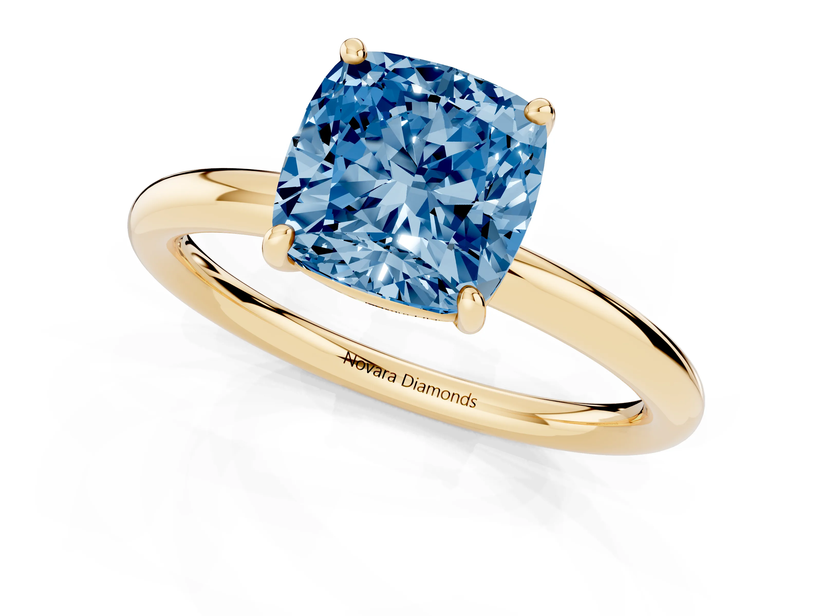 Fancy Blue Cushion Cut Diamond Solitaire Ring Set in Yellow gold with Prong Setting on a Polished Plain Band