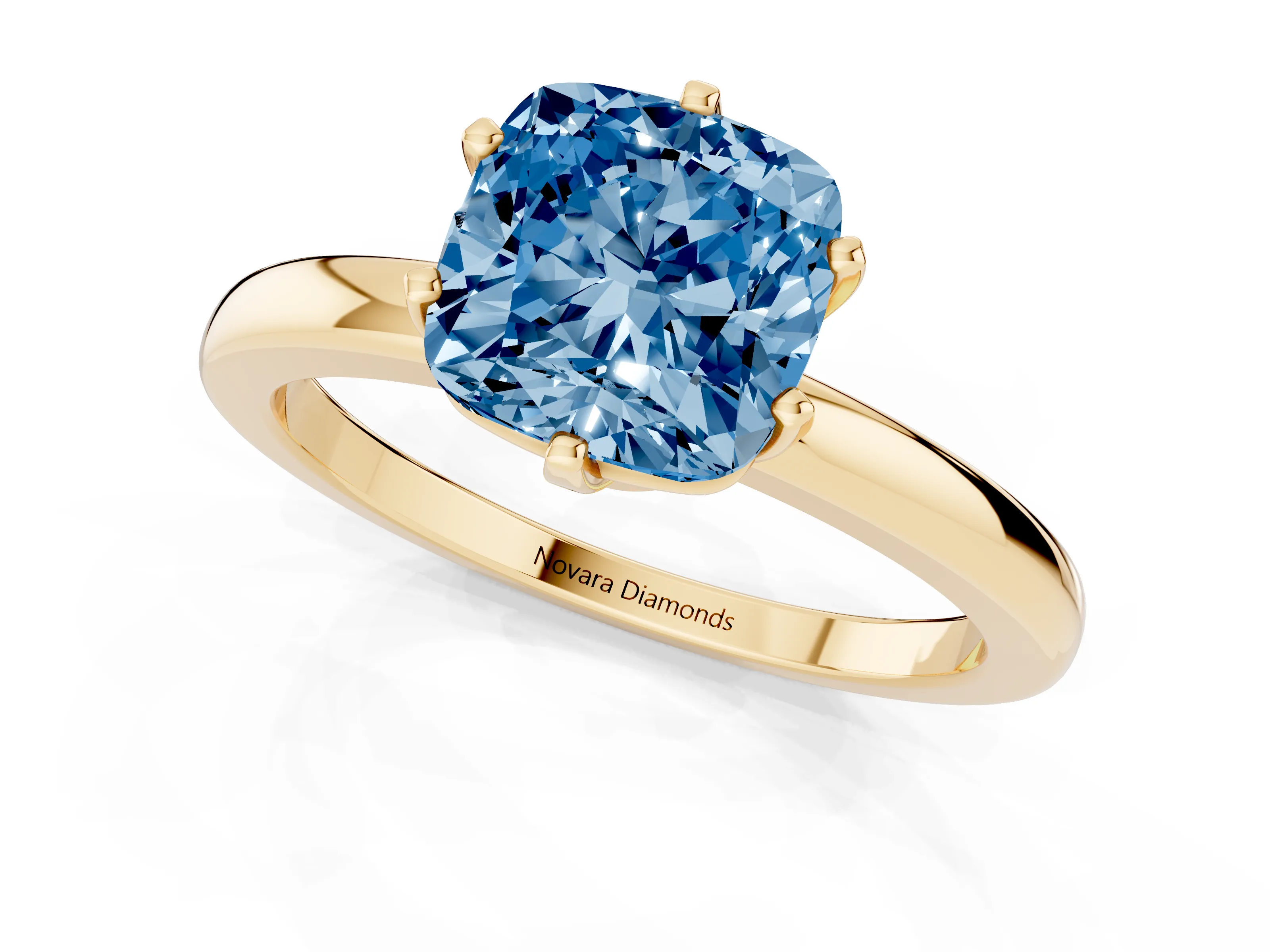 Fancy Blue Cushion Cut Diamond Solitaire Ring Set in Yellow gold with Raised Prong Setting on a Classic Band