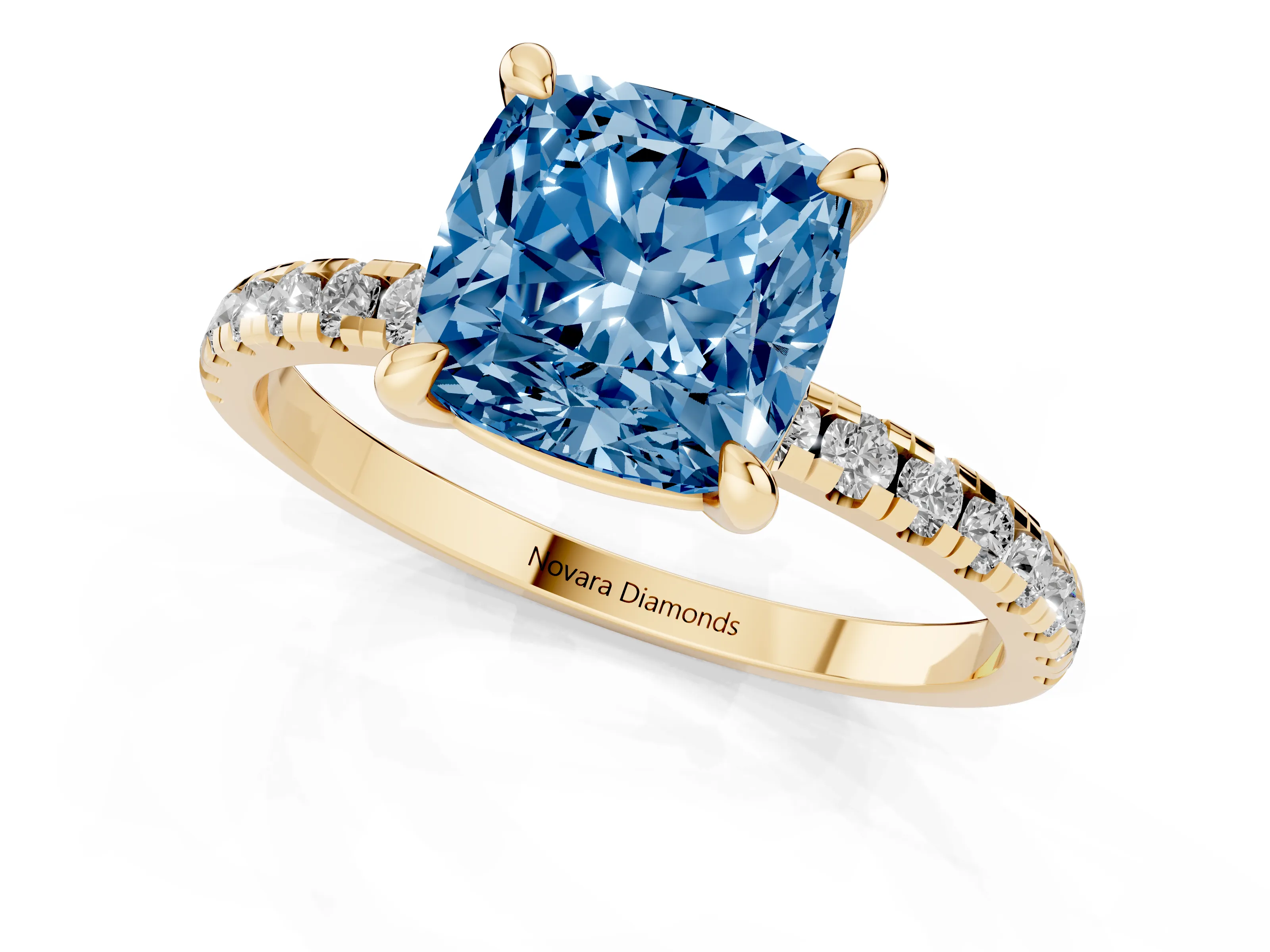 Fancy Blue Cushion Cut Diamond Brilliant Solitaire Ring Set in Yellow gold with Pavé Band and Prong Setting