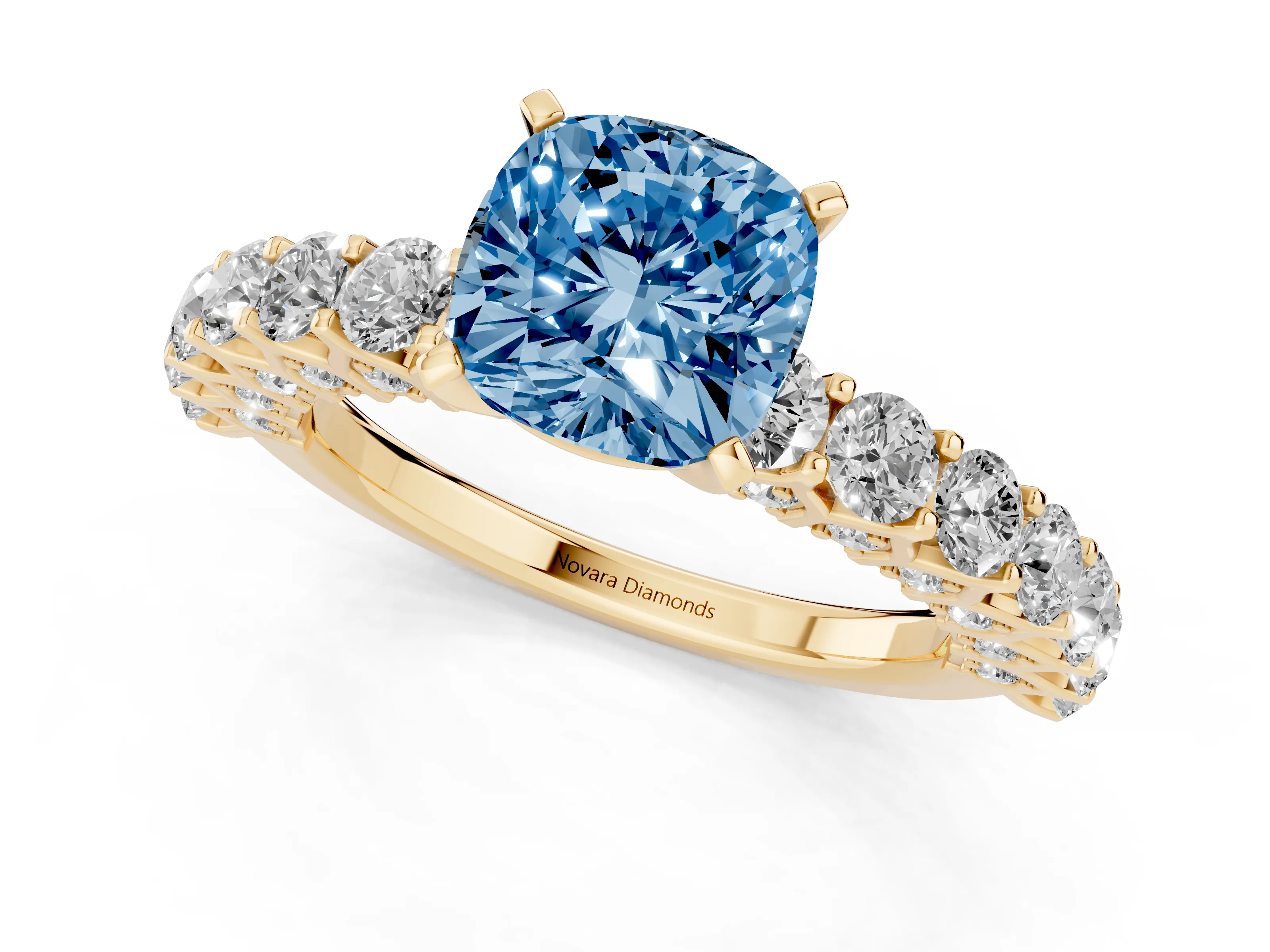 Fancy Blue Cushion Cut Diamond Solitaire Ring Set in Yellow gold with Shared Prong Pavé Band