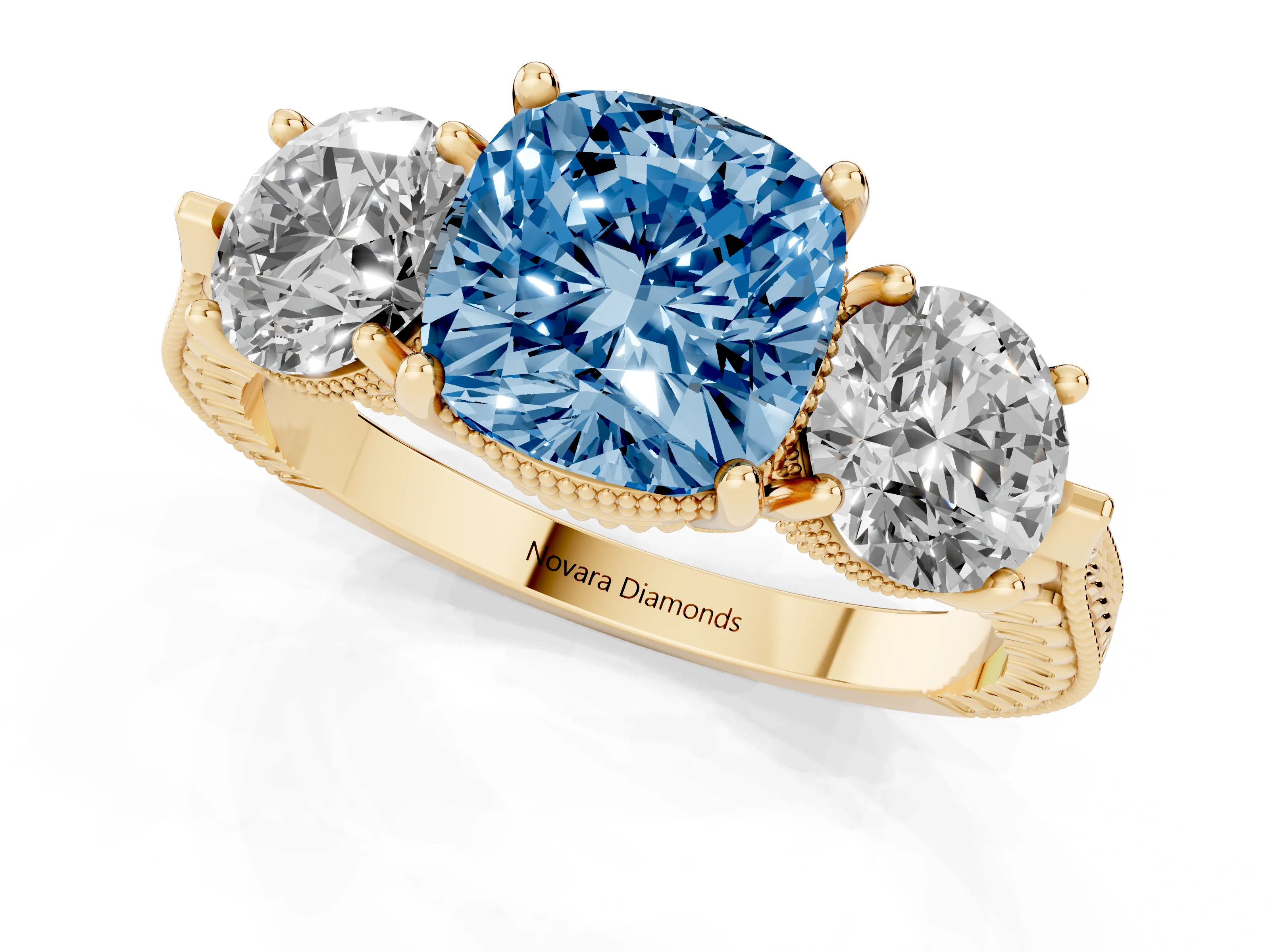 Fancy Blue Cushion Cut Diamond Three-Stone Ring Set in Yellow gold with Milgrain Band