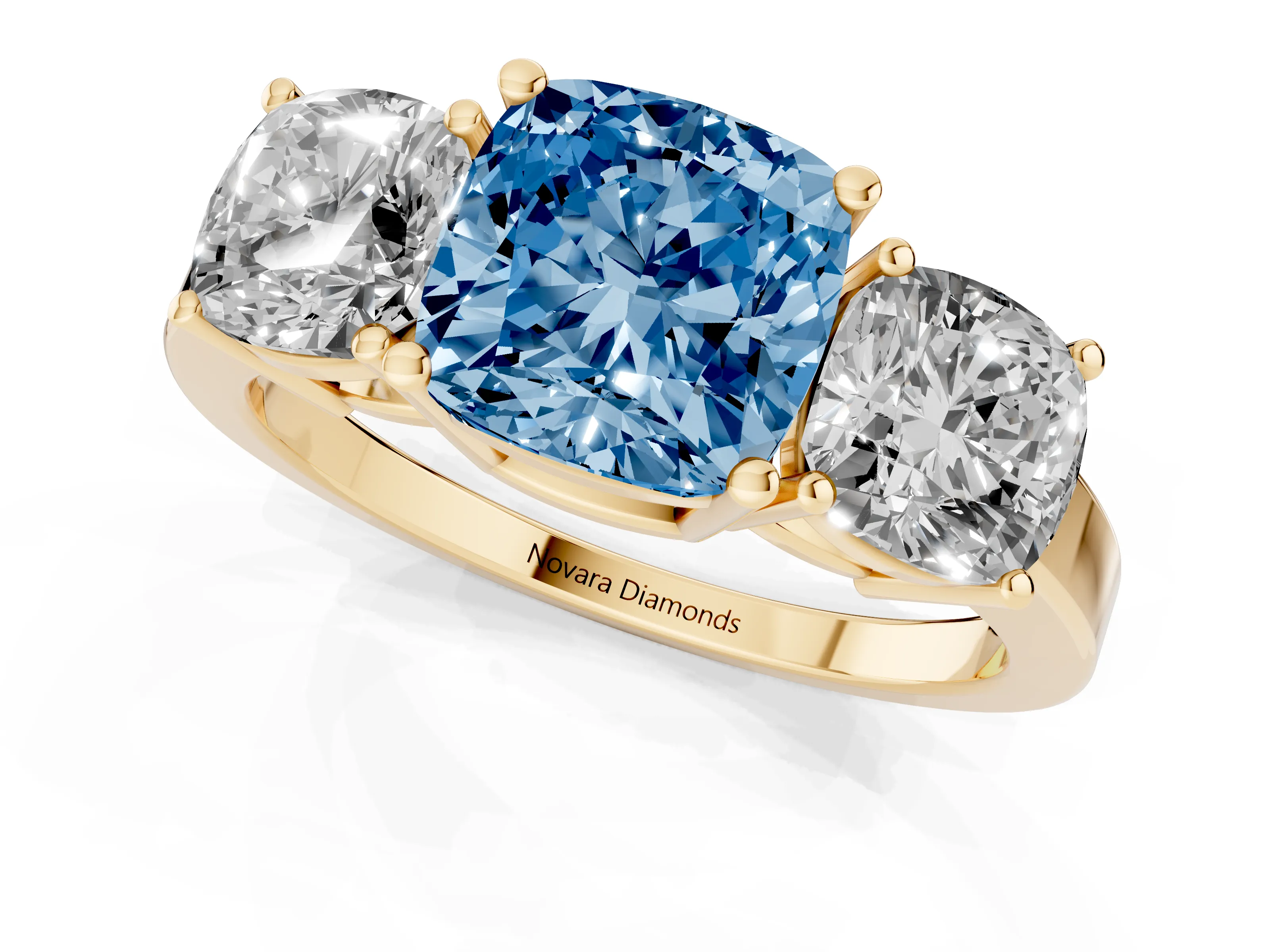Fancy Blue Cushion Cut Diamond Three-Stone Engagement Ring Set in Yellow gold with Flat Band