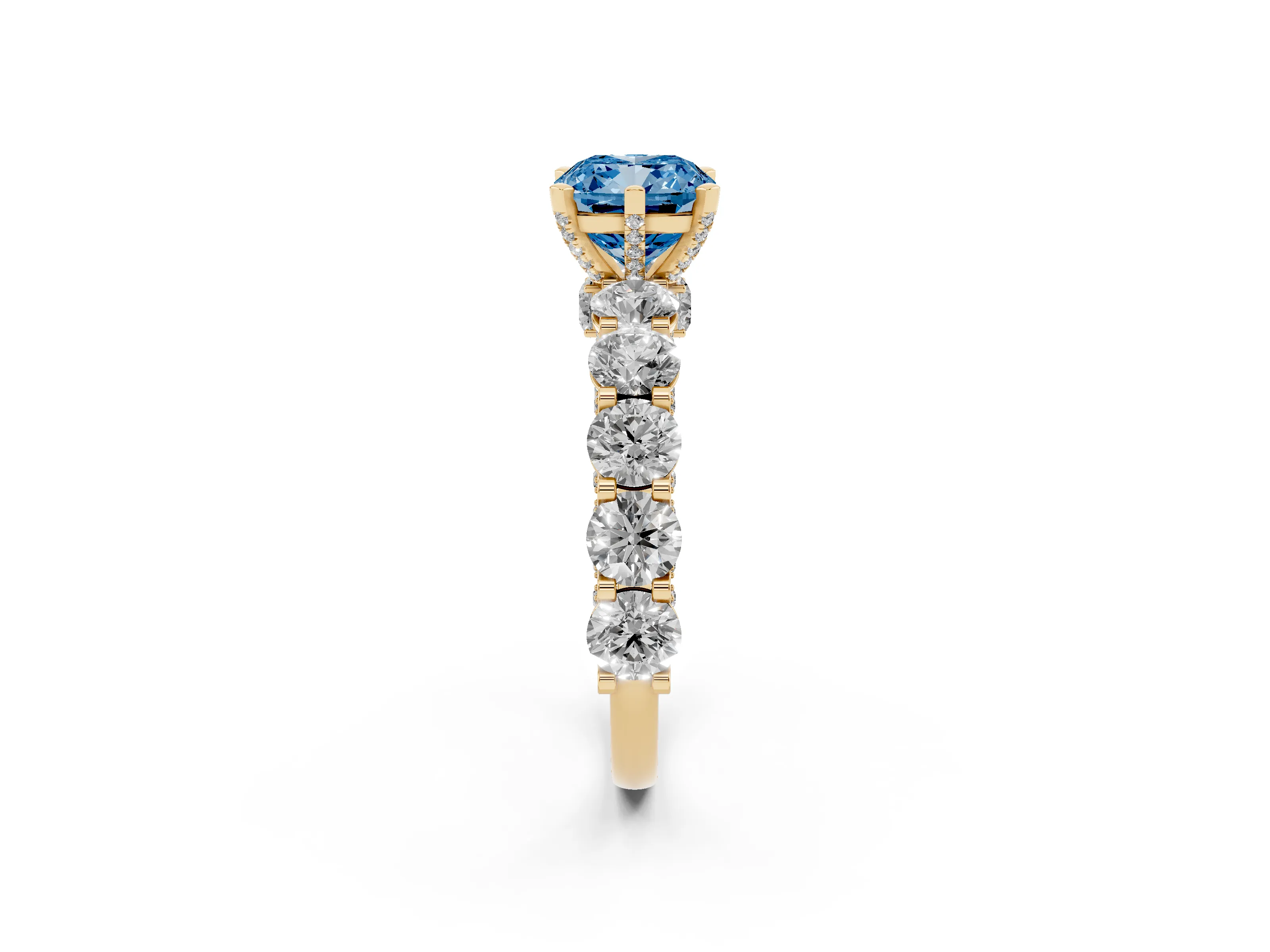 Fancy Blue Cushion Cut Diamond Side Stone Ring Set in Yellow gold with Alternating Round and Oval Side Stones