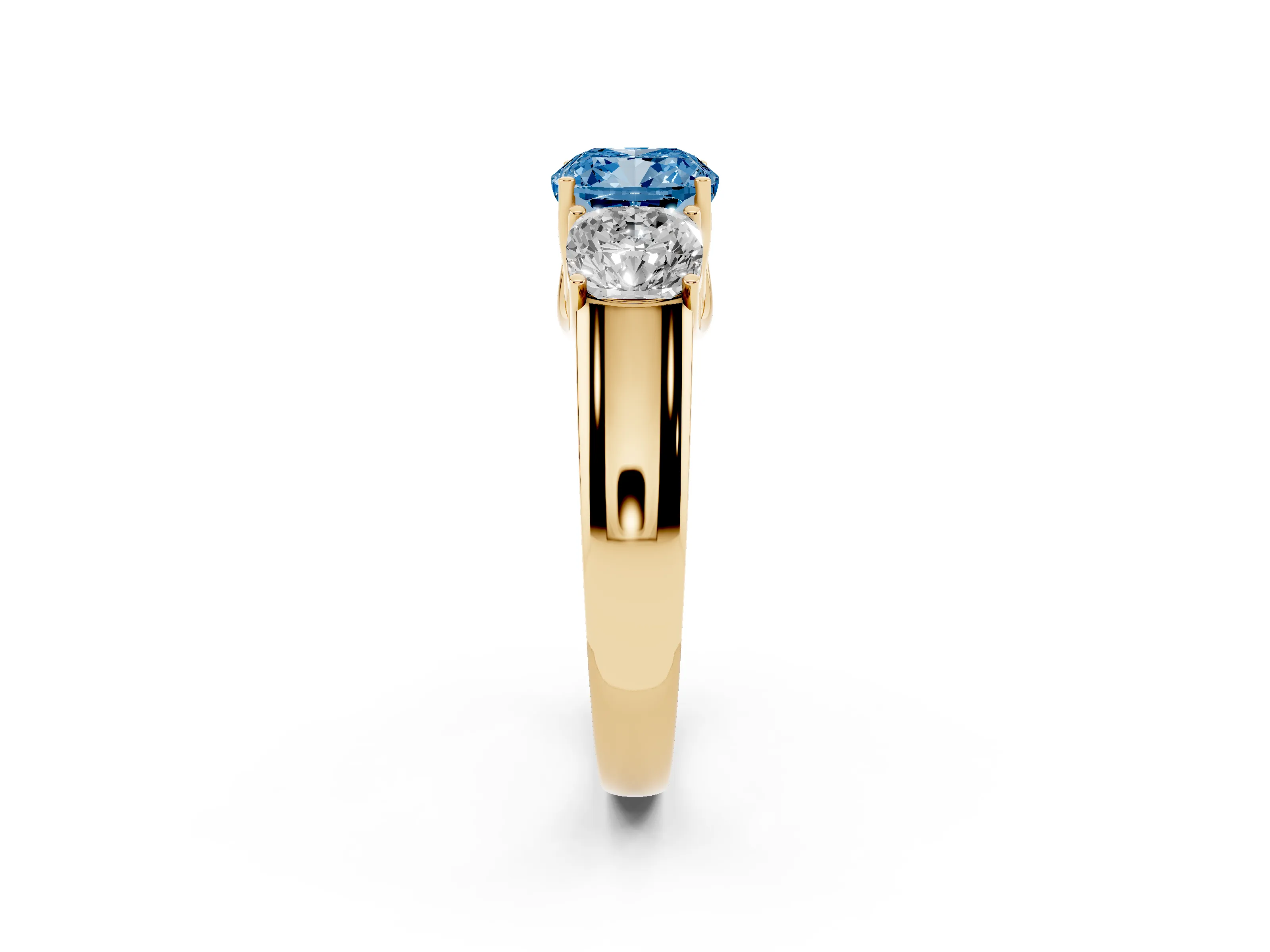 Fancy Blue Three-Stone Cushion Cut Diamond Ring Set in Yellow gold with Matching Prong Settings and Plain Band