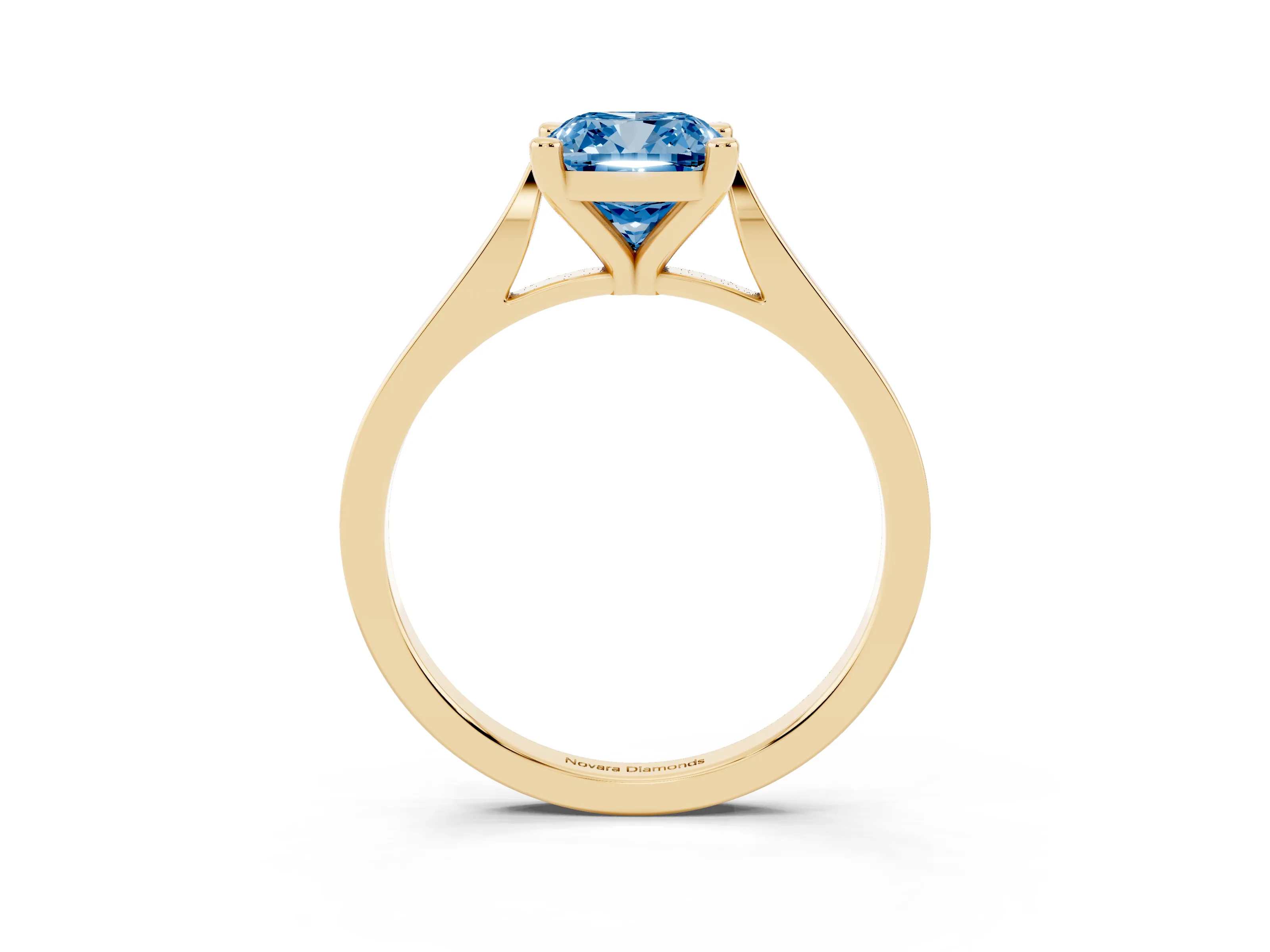 Fancy Blue Cushion Cut Diamond Solitaire Ring Set in Yellow gold with Prong Setting and Tapered Band