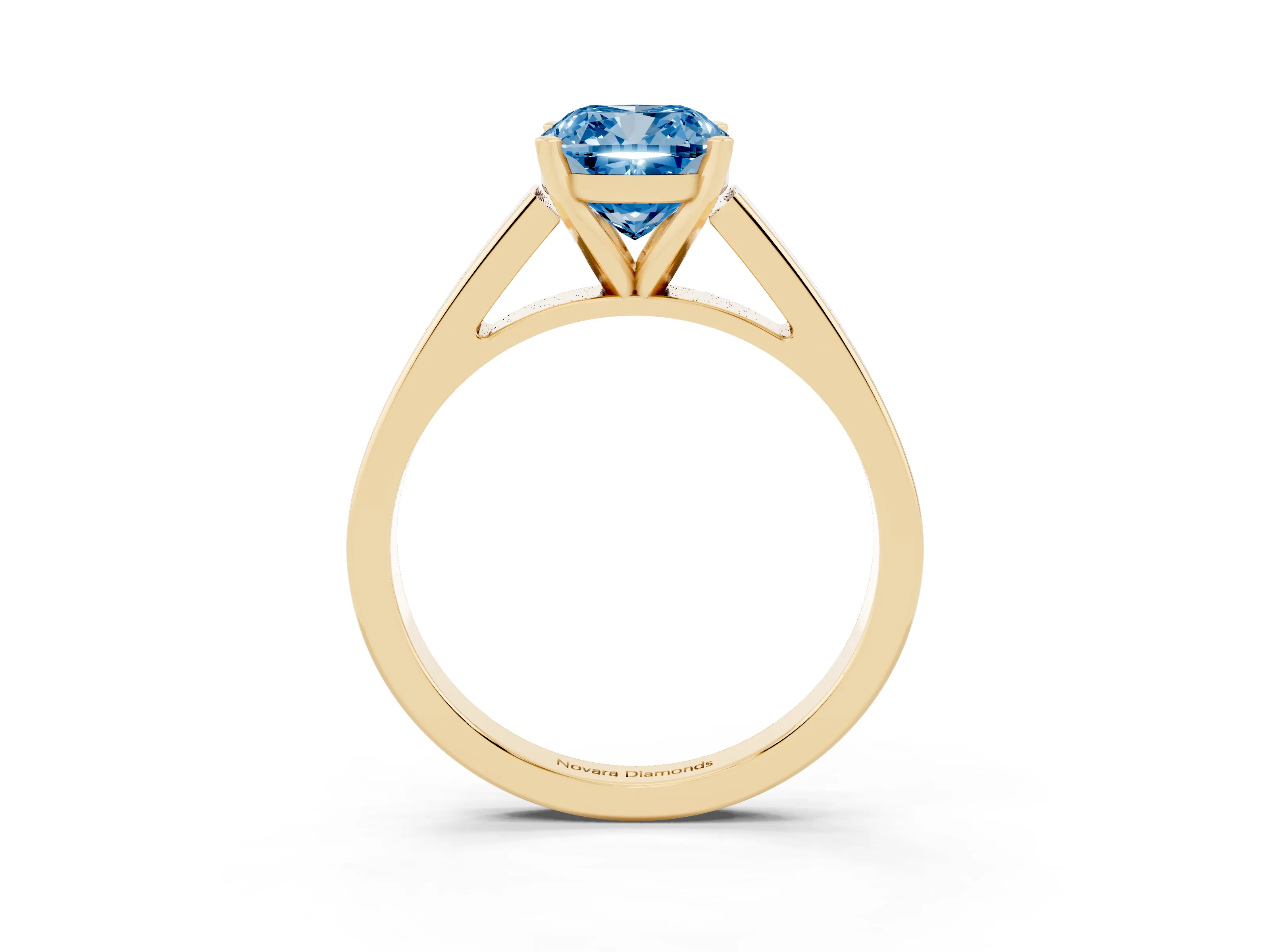 Fancy Blue Cushion Cut Diamond Solitaire Engagement Ring Set in Yellow gold with Prong Setting and Tapered Band