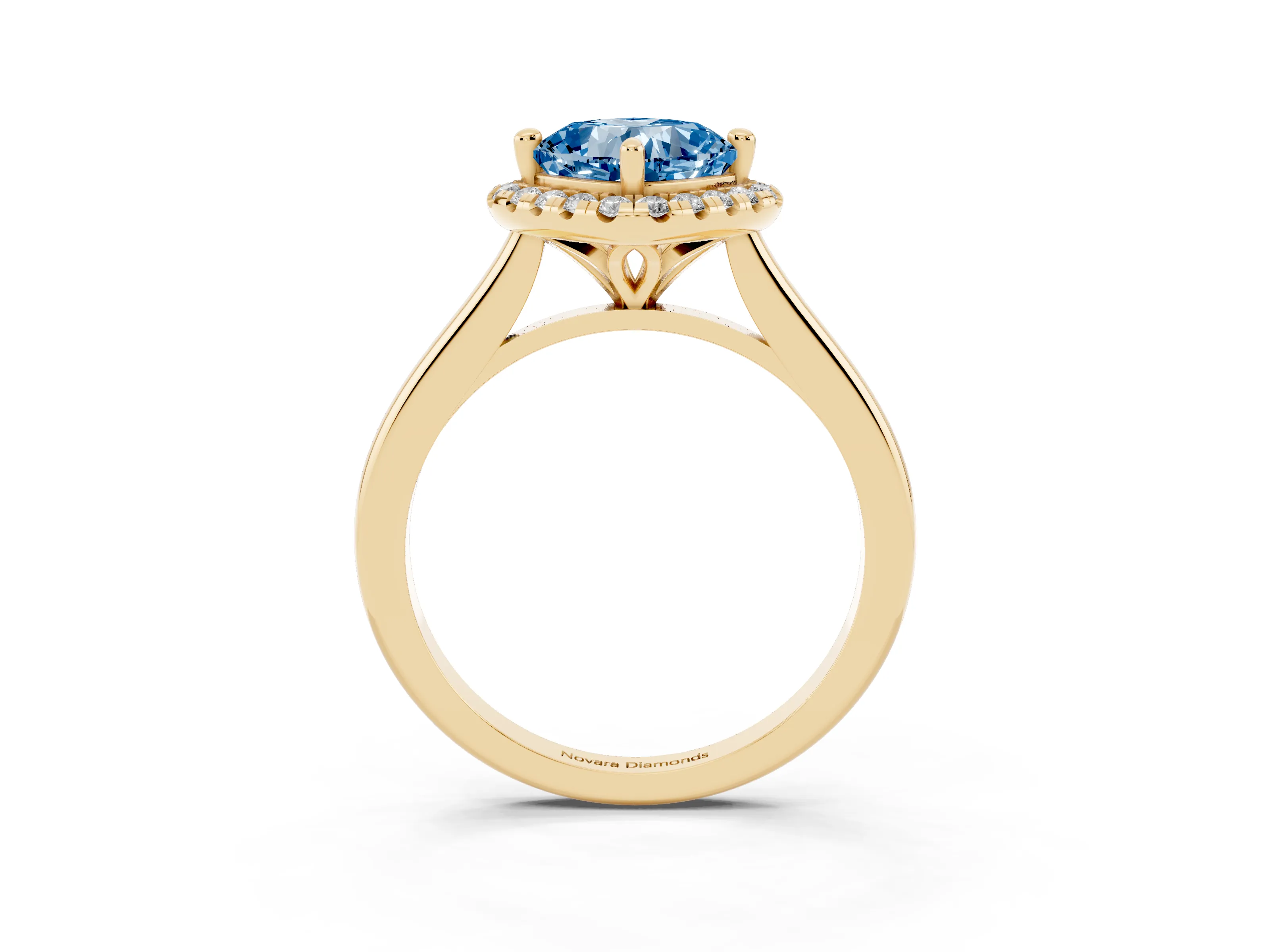 Fancy Blue Cushion Cut Diamond Halo Engagement Ring Set in Yellow gold with Pavé Band and Rising Shoulders