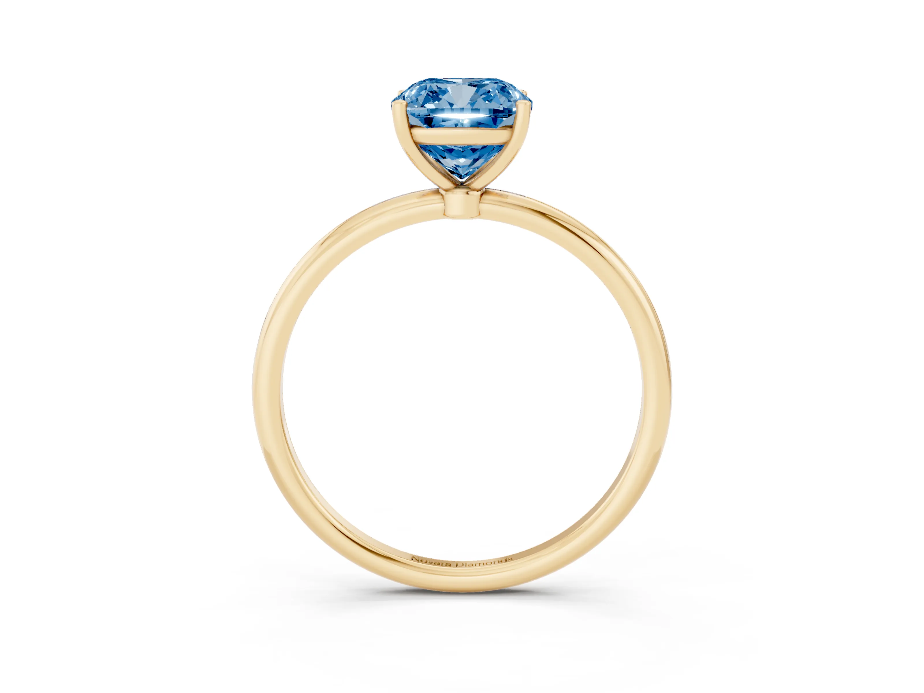 Fancy Blue Cushion Cut Diamond Solitaire Engagement Ring Set in Yellow gold with Thin Band and Prong Setting