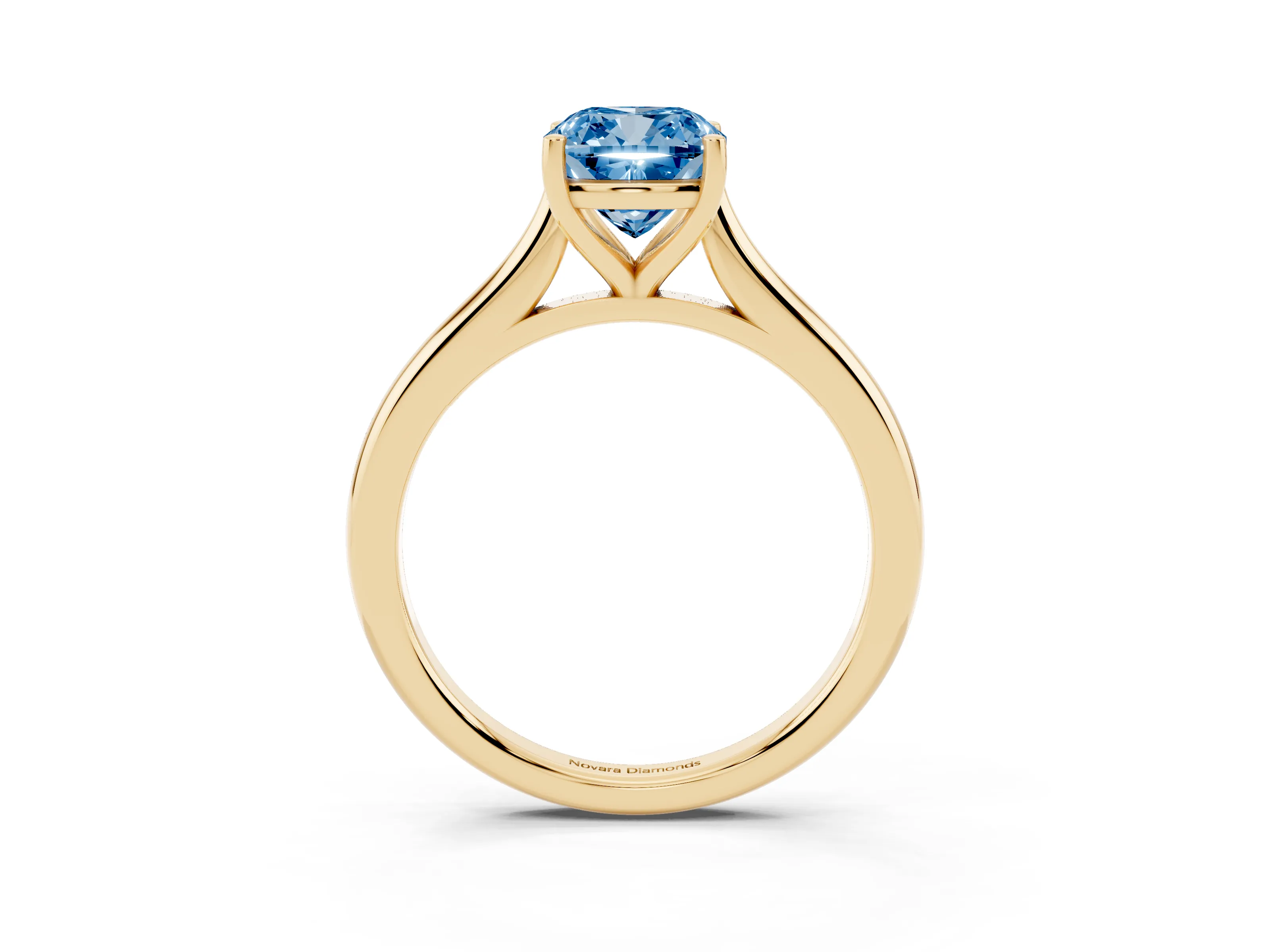Fancy Blue Cushion Cut Diamond Solitaire Ring Set in Yellow gold with Cathedral Band and Prong Setting