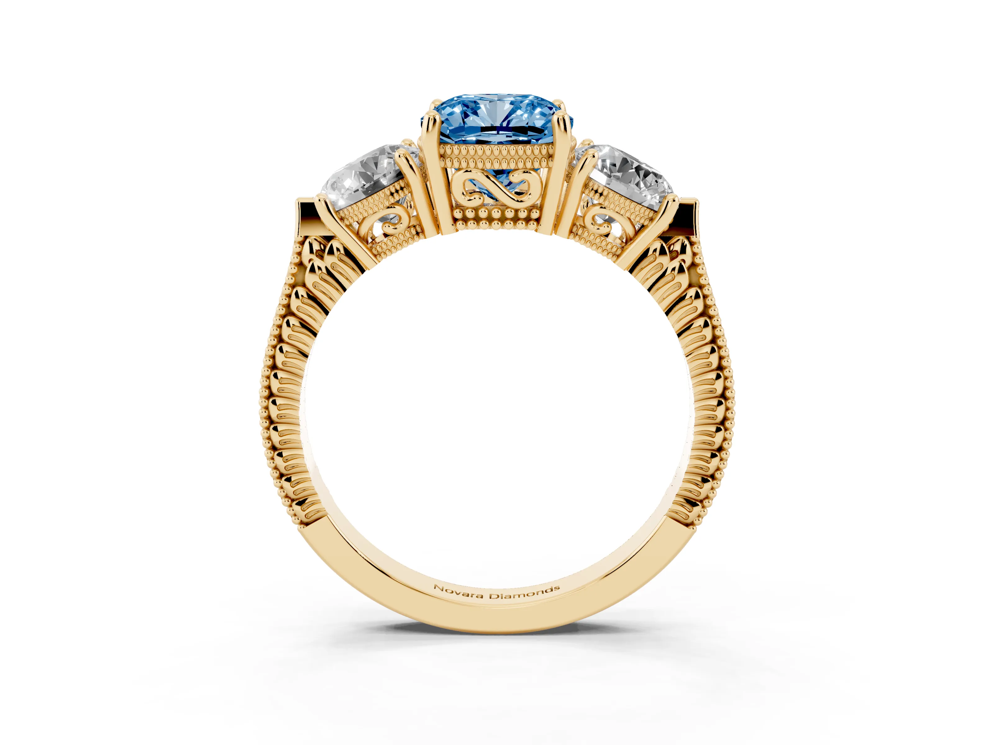 Fancy Blue Cushion Cut Diamond Three-Stone Ring Set in Yellow gold with Milgrain Band