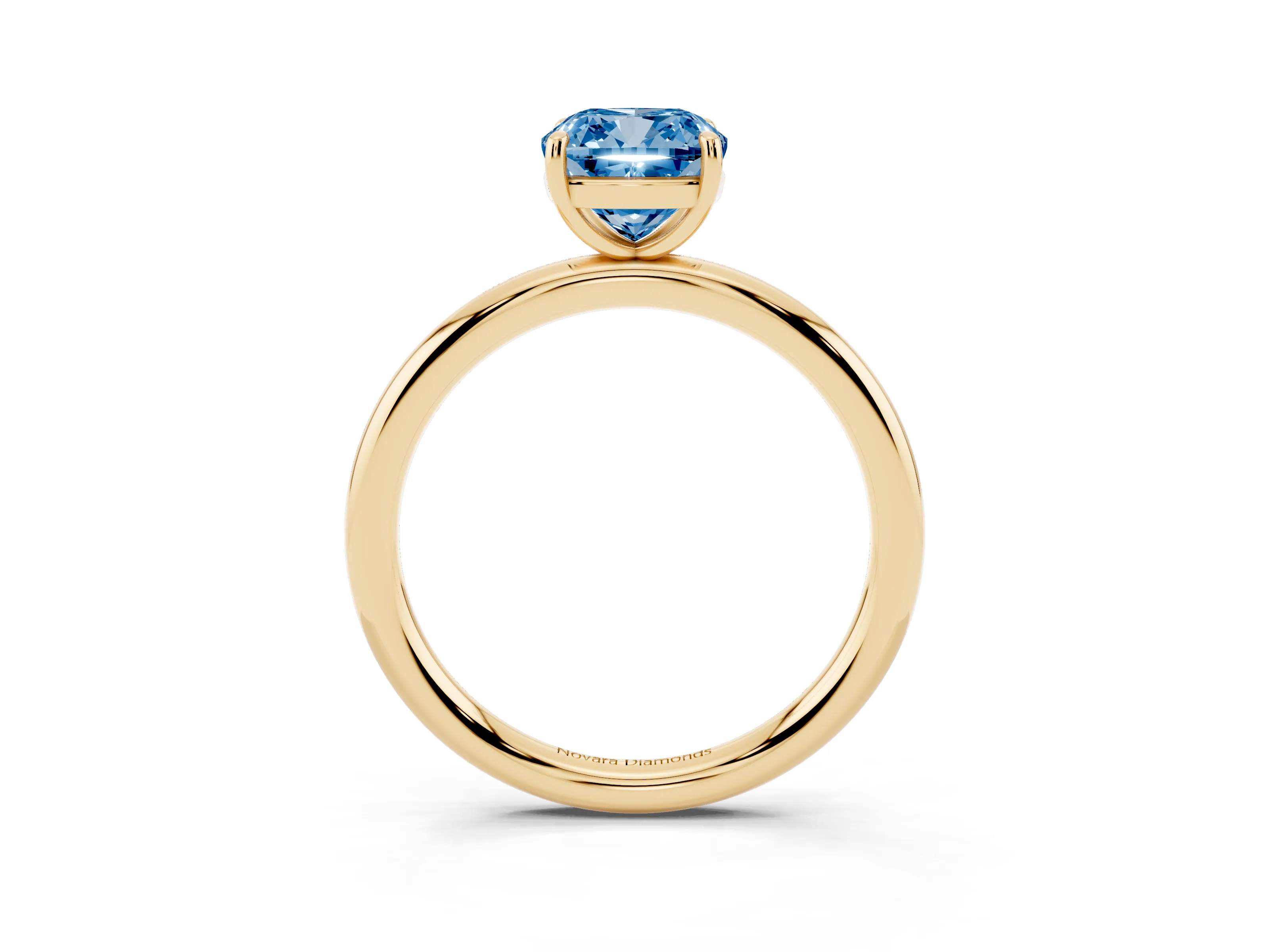 Fancy Blue Cushion Cut Diamond Solitaire Ring Set in Yellow gold with Prong Setting on a Polished Plain Band