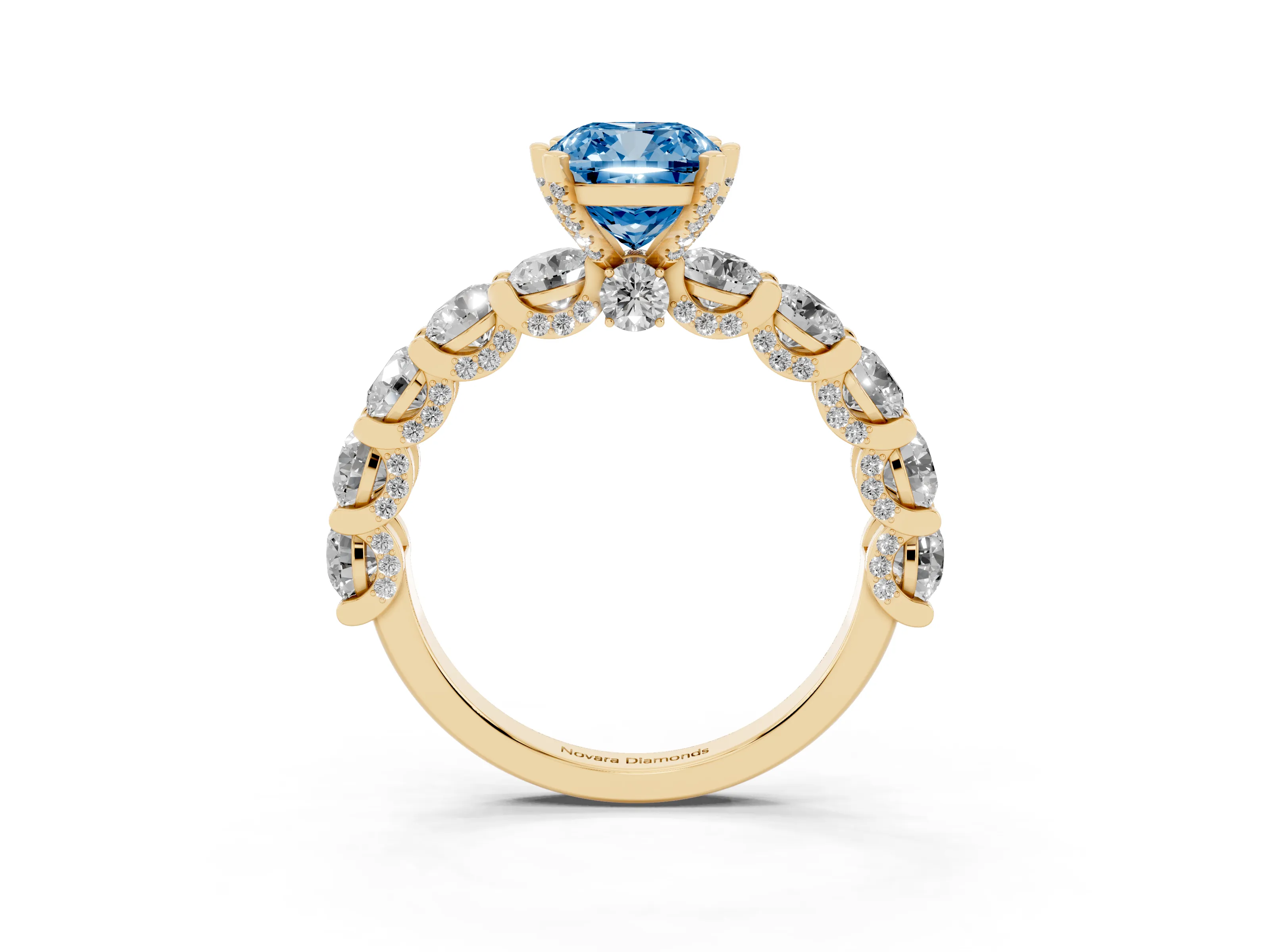 Fancy Blue Cushion Cut Diamond Side Stone Ring Set in Yellow gold with Alternating Round and Oval Side Stones