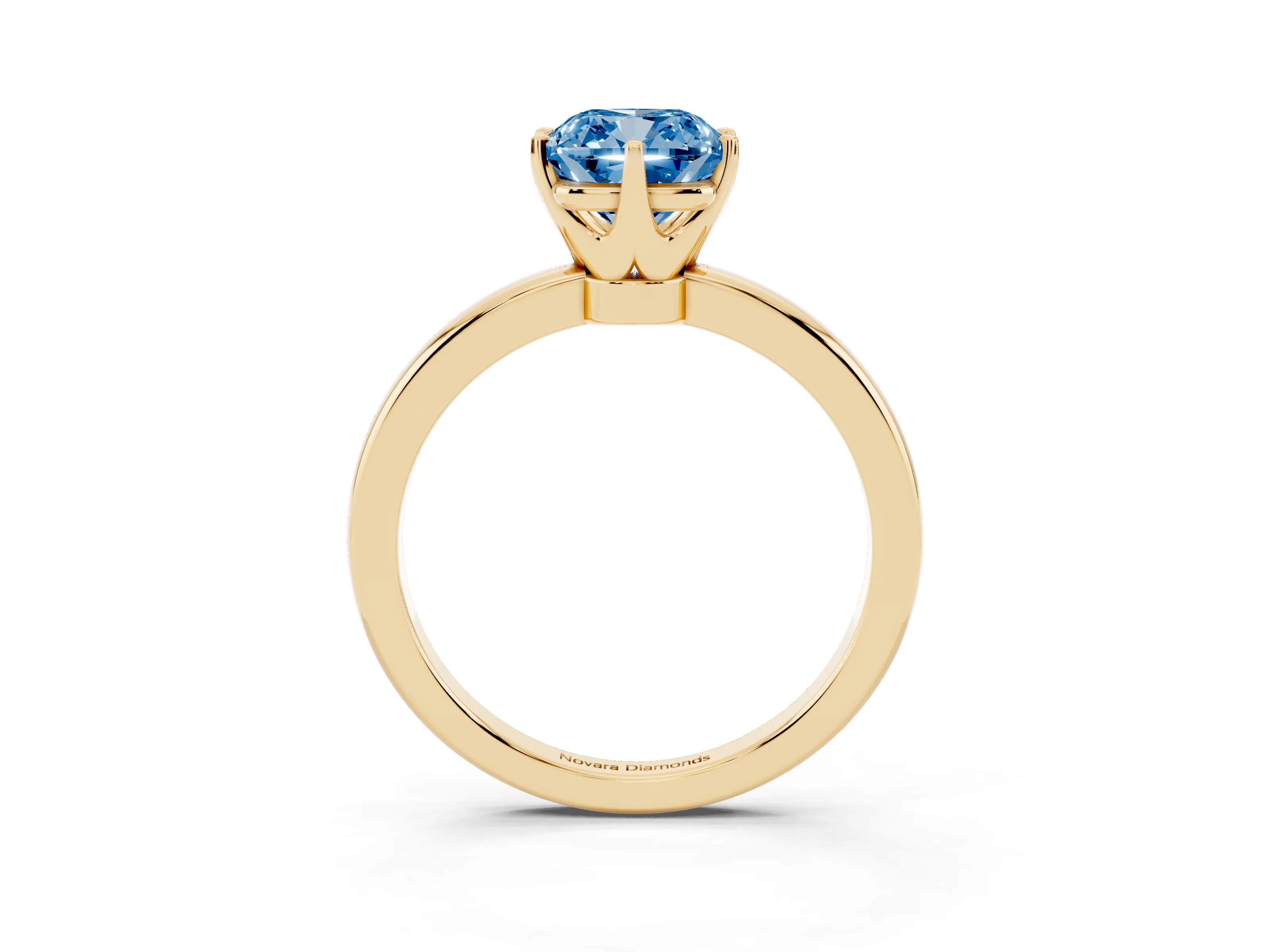 Fancy Blue Cushion Cut Diamond Solitaire Ring Set in Yellow gold with Raised Prong Setting on a Classic Band