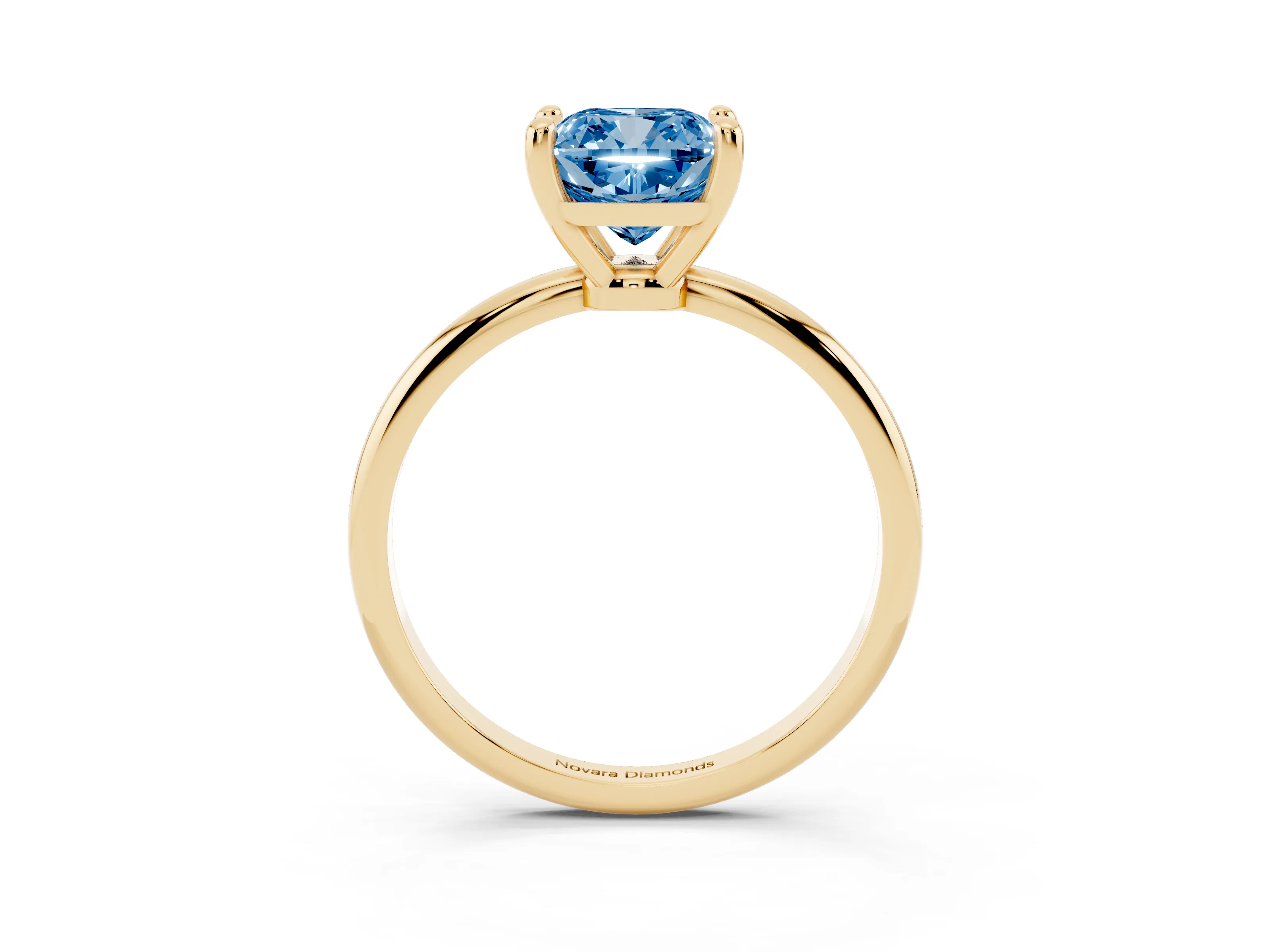 Fancy Blue Cushion Cut Diamond Solitaire Ring Set in Yellow gold with Secure Prong Setting on a Classic Band