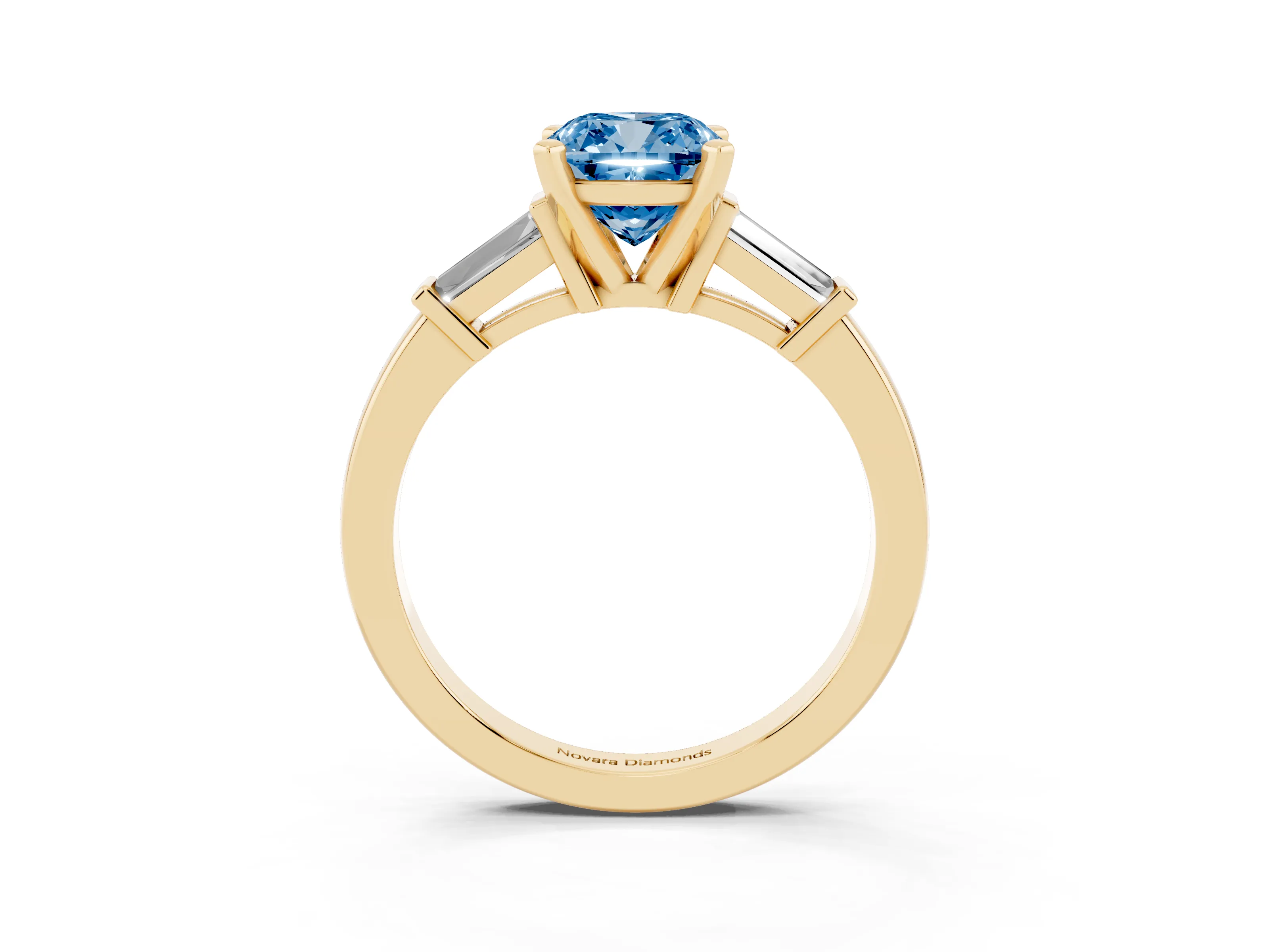 Fancy Blue Cushion Cut Diamond Solitaire Ring Set in Yellow gold with Tapered Baguette Accents and Prong Setting