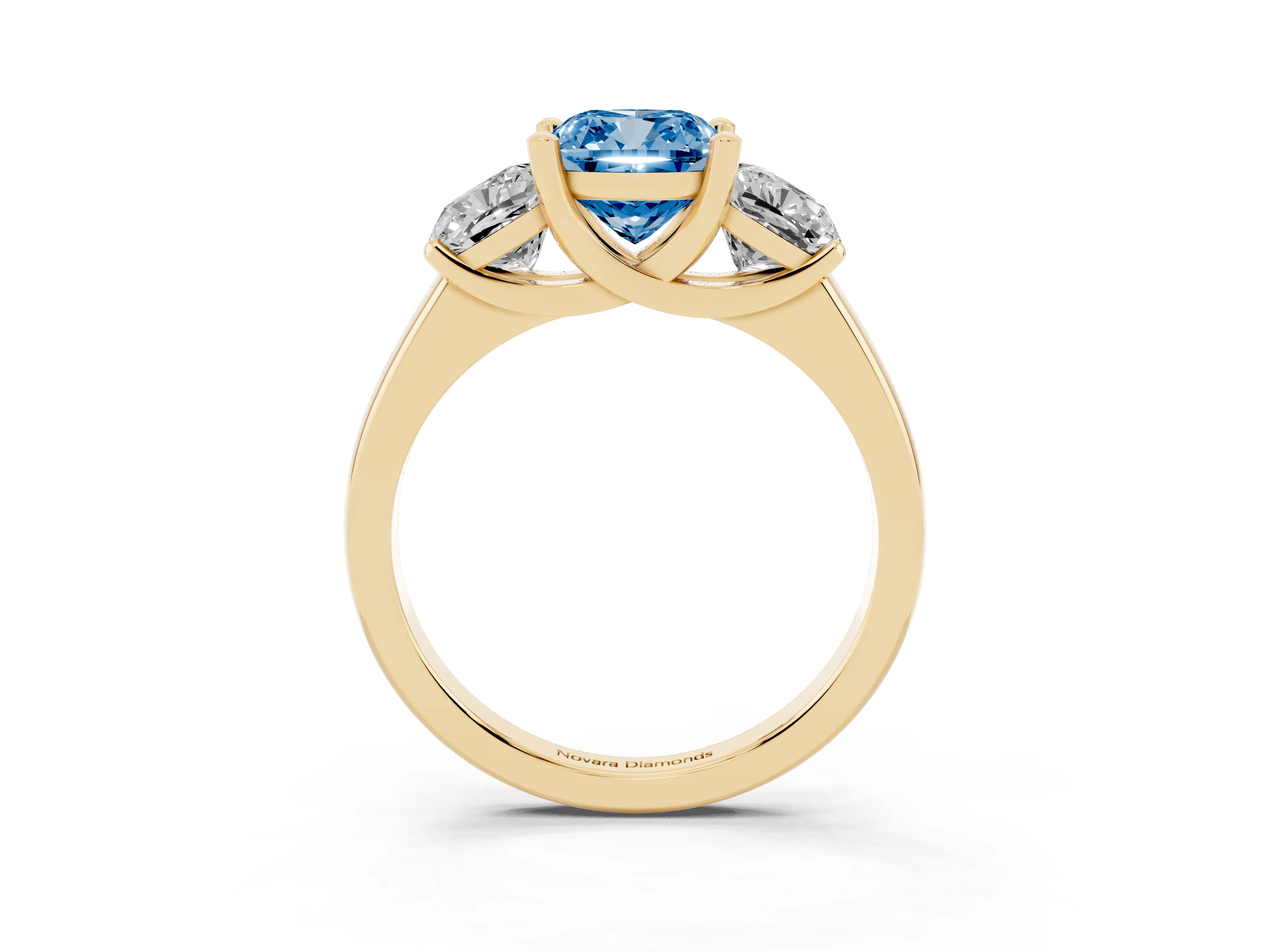 Fancy Blue Cushion Cut Diamond Three-Stone Ring Set in Yellow gold with Classic Prong Setting and Plain Band