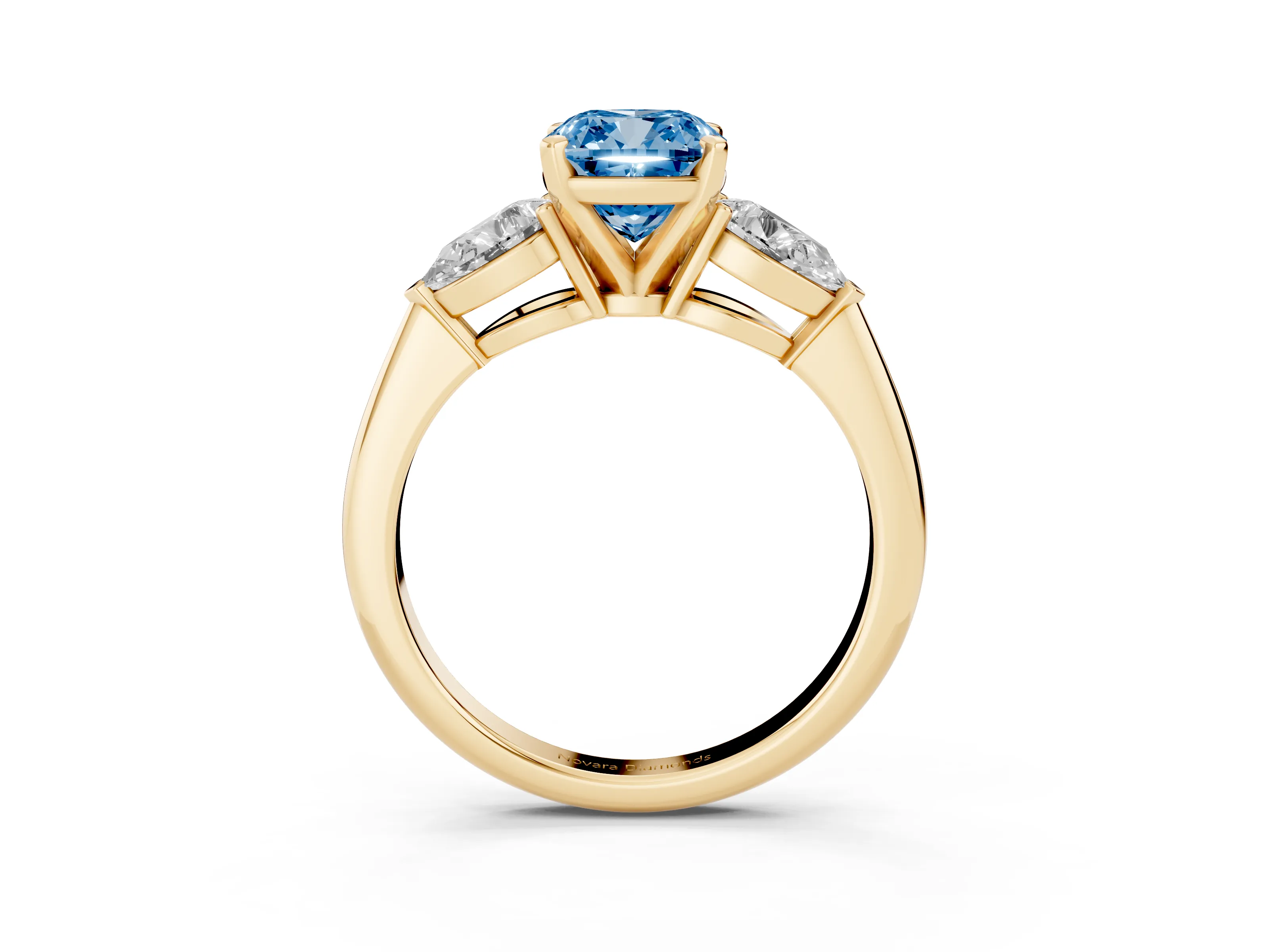 Fancy Blue Three-Stone Cushion Cut Diamond Ring Set in Yellow gold with Pear Side Stones and Prong Setting