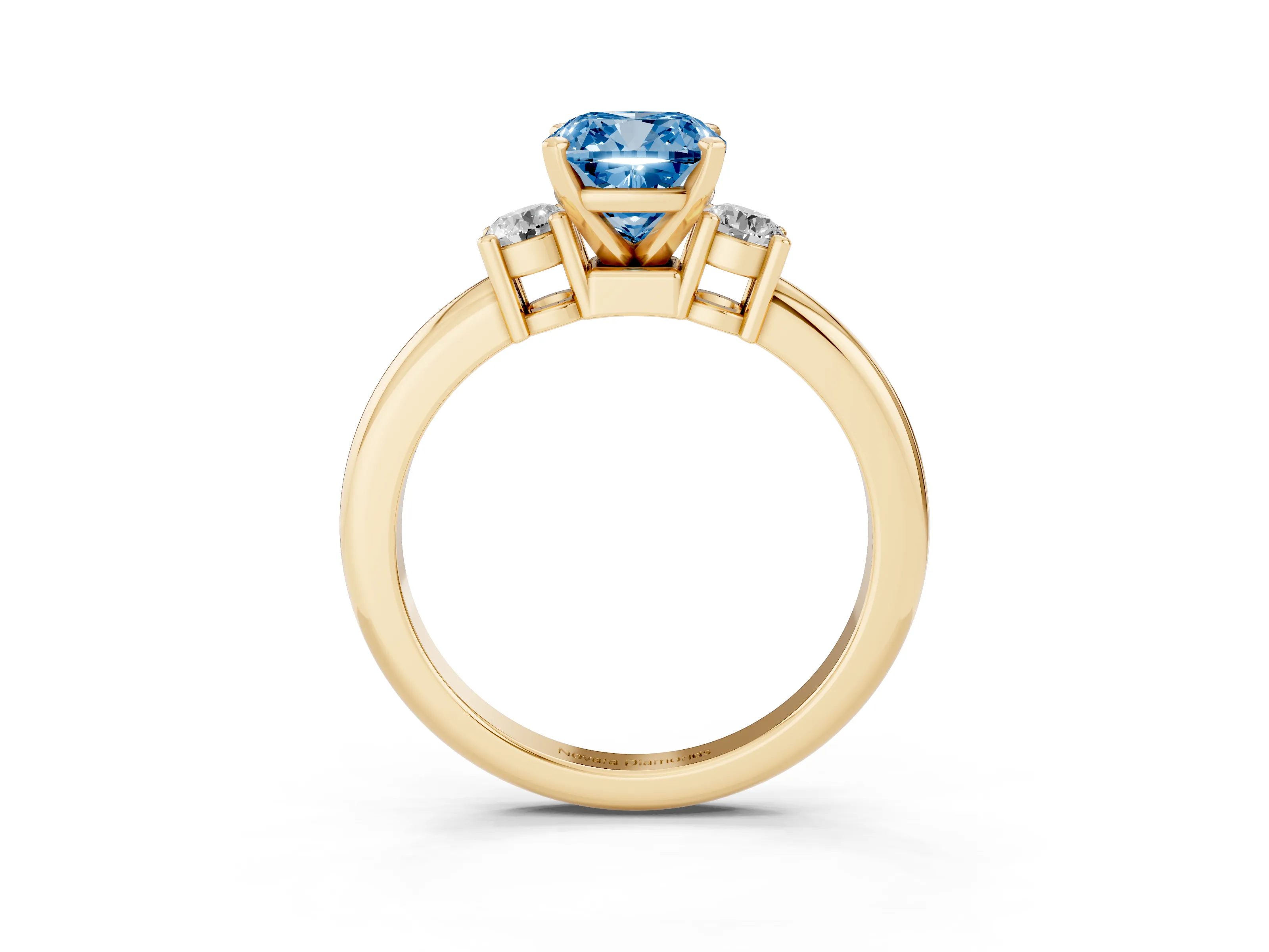Fancy Blue Three-Stone Cushion Cut Diamond Ring Set in Yellow gold with Prong Setting and Plain Band