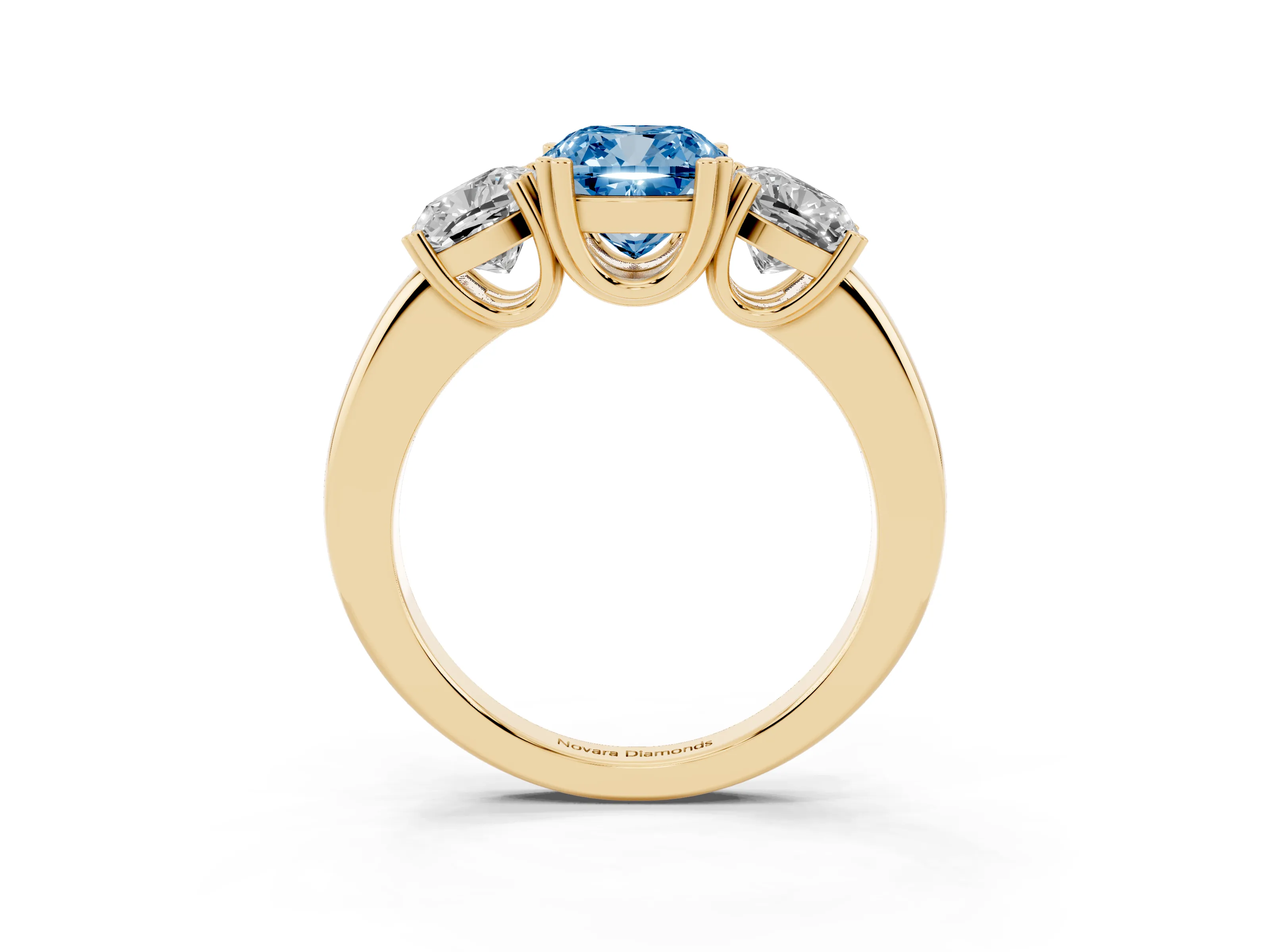 Fancy Blue Cushion Cut Diamond Three-Stone Ring Set in Yellow gold with Polished Band and Prong Setting