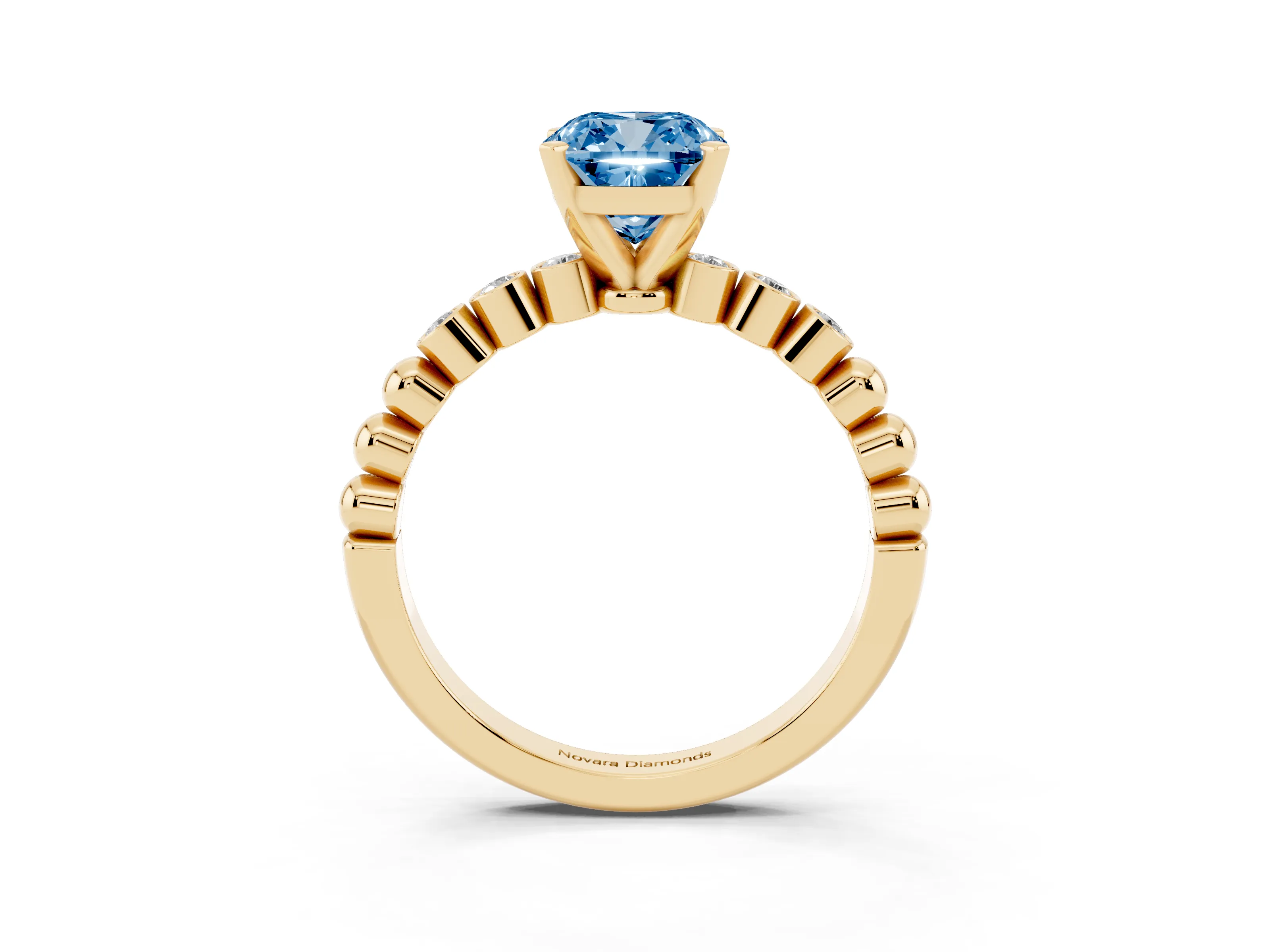Fancy Blue Cushion Cut Diamond Solitaire Engagement Ring Set in Yellow gold with Bezel Accents on Beaded Band