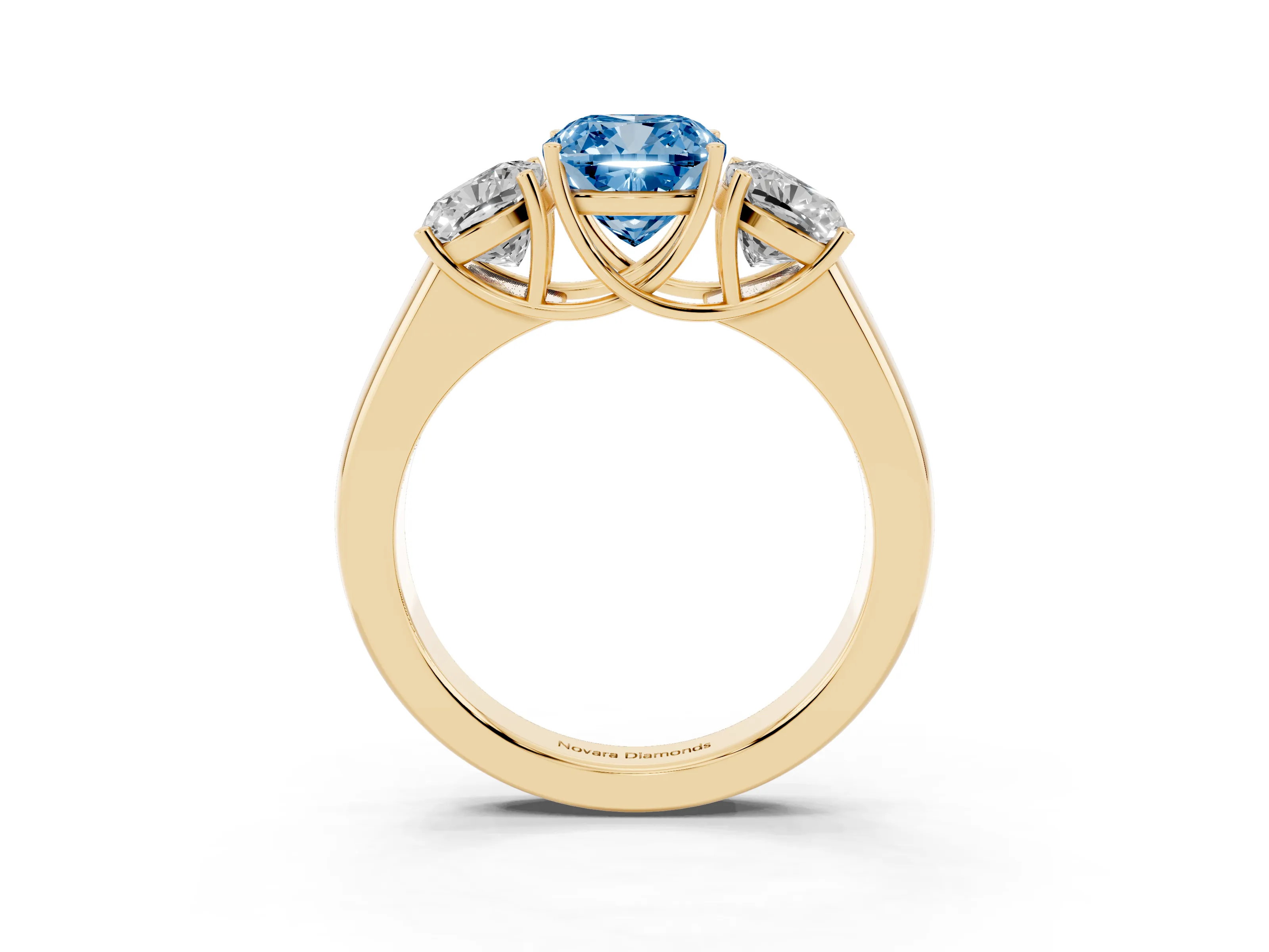 Fancy Blue Three-Stone Cushion Cut Diamond Ring Set in Yellow gold with Matching Prong Settings and Plain Band
