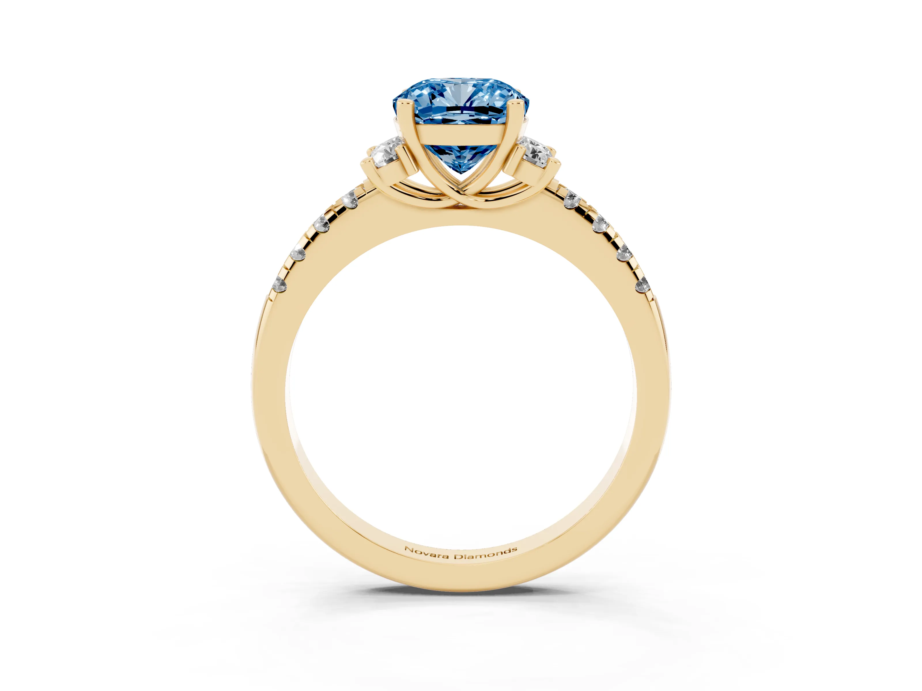 Fancy Blue Cushion Cut Diamond Three-Stone Pavé Ring Set in Yellow gold with Prong Setting