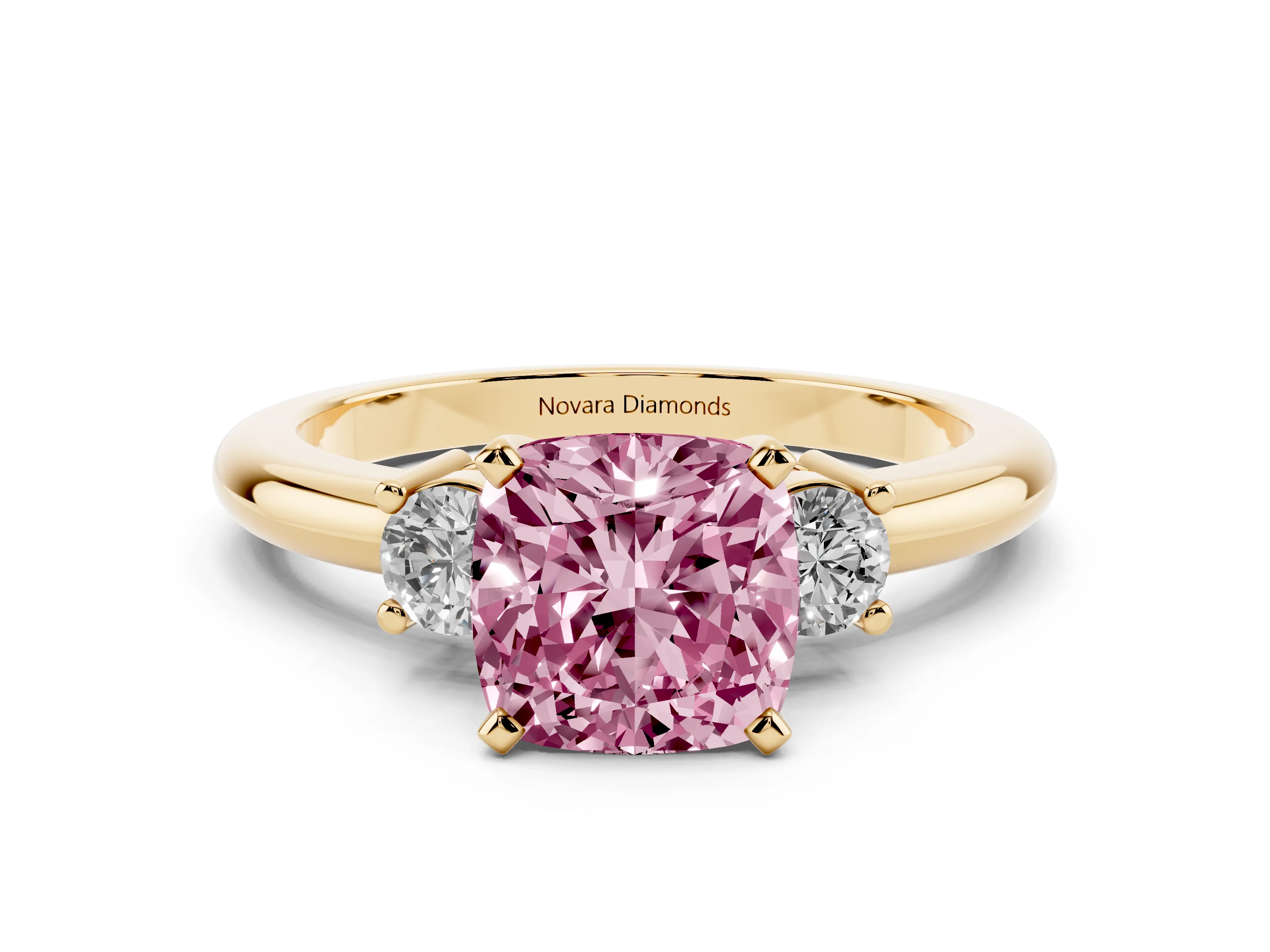 Fancy Pink Three-Stone Cushion Cut Diamond Ring Set in Yellow gold with Prong Setting and Plain Band