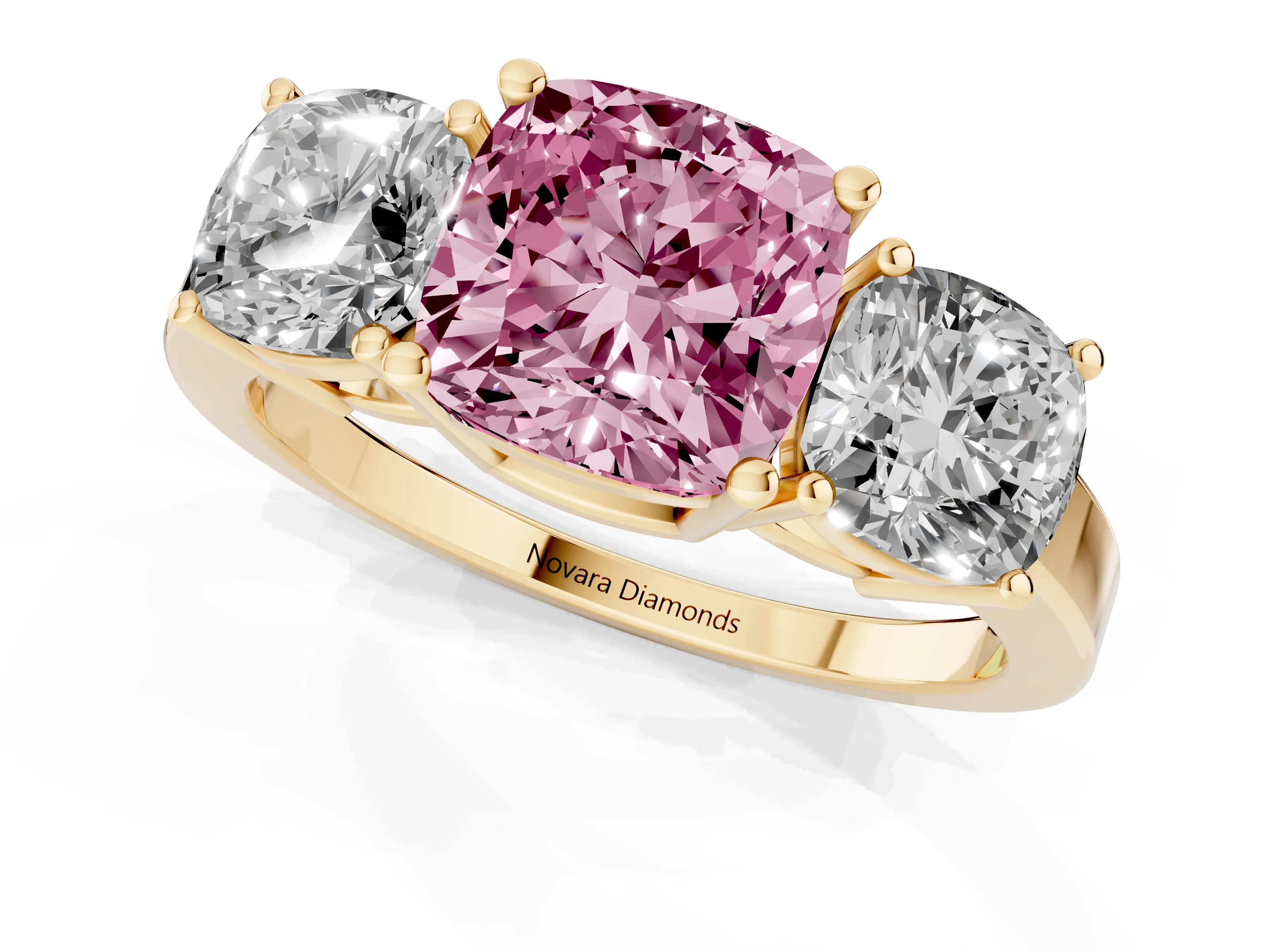 Fancy Pink Cushion Cut Diamond Three-Stone Engagement Ring Set in Yellow gold with Flat Band