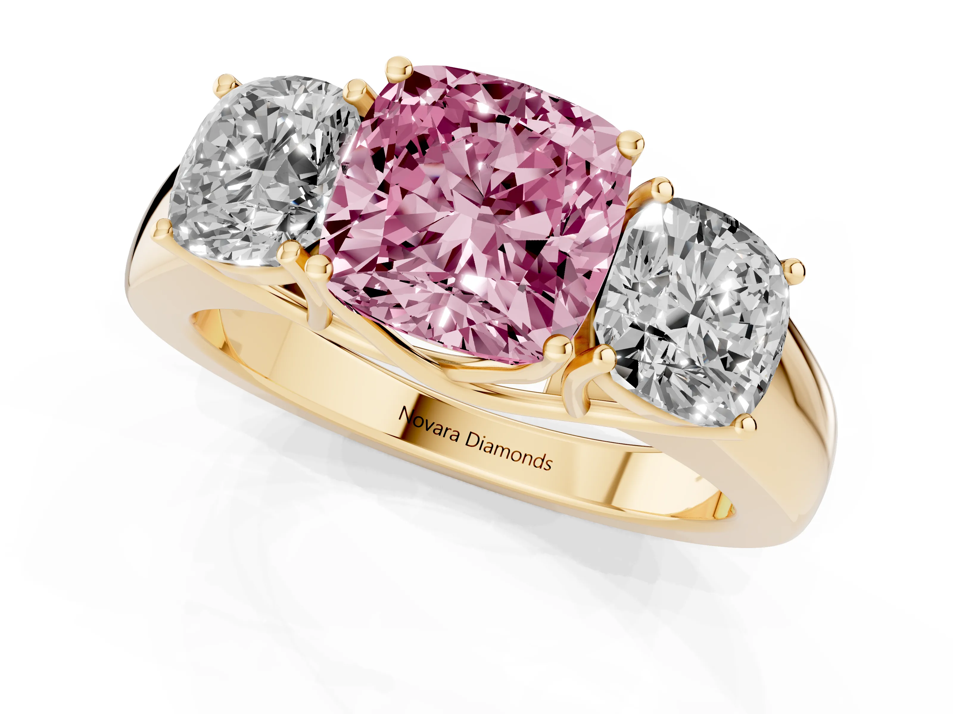 Fancy Pink Three-Stone Cushion Cut Diamond Ring Set in Yellow gold with Matching Prong Settings and Plain Band