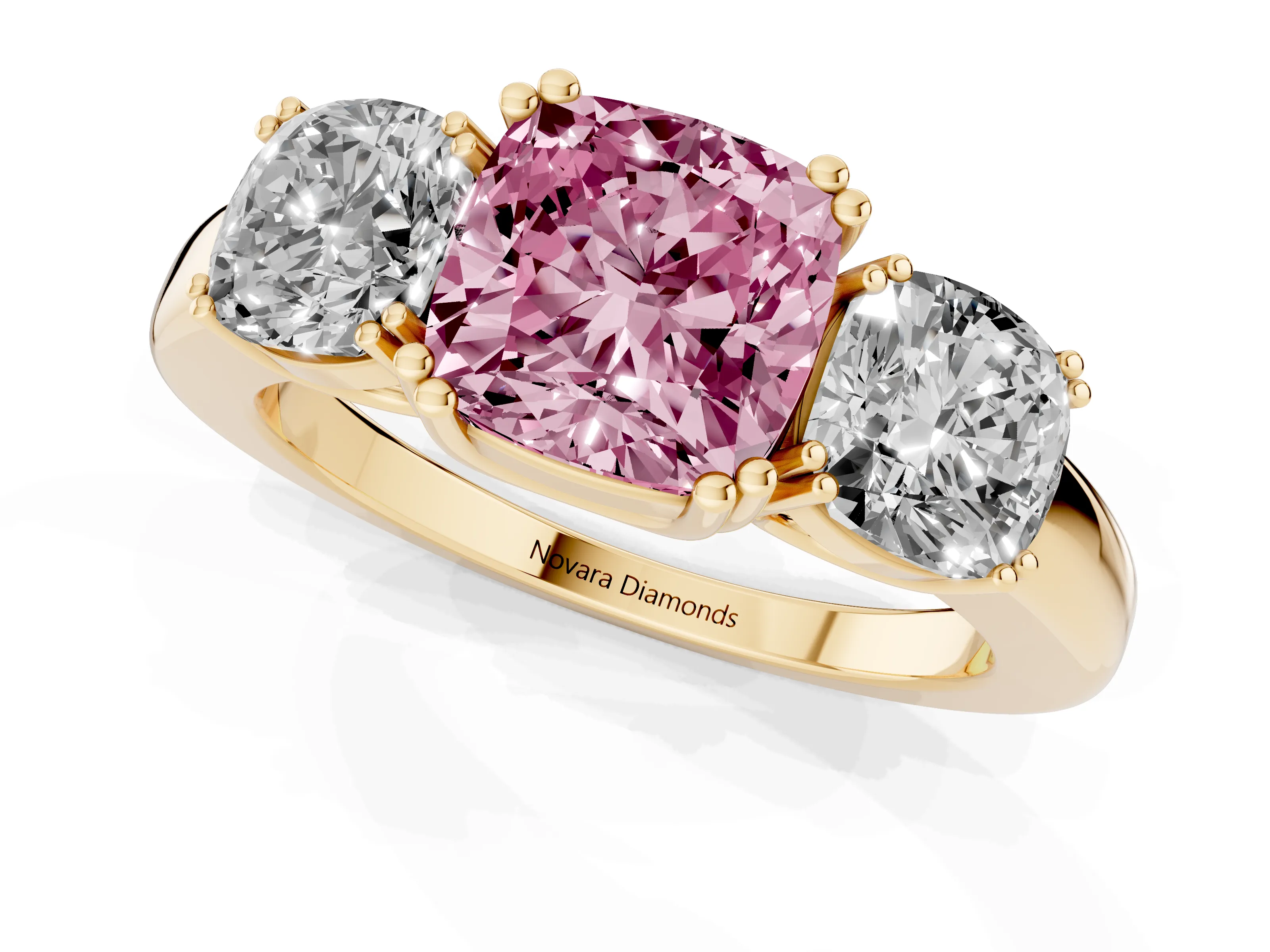 Fancy Pink Cushion Cut Diamond Three-Stone Ring Set in Yellow gold with Polished Band and Prong Setting