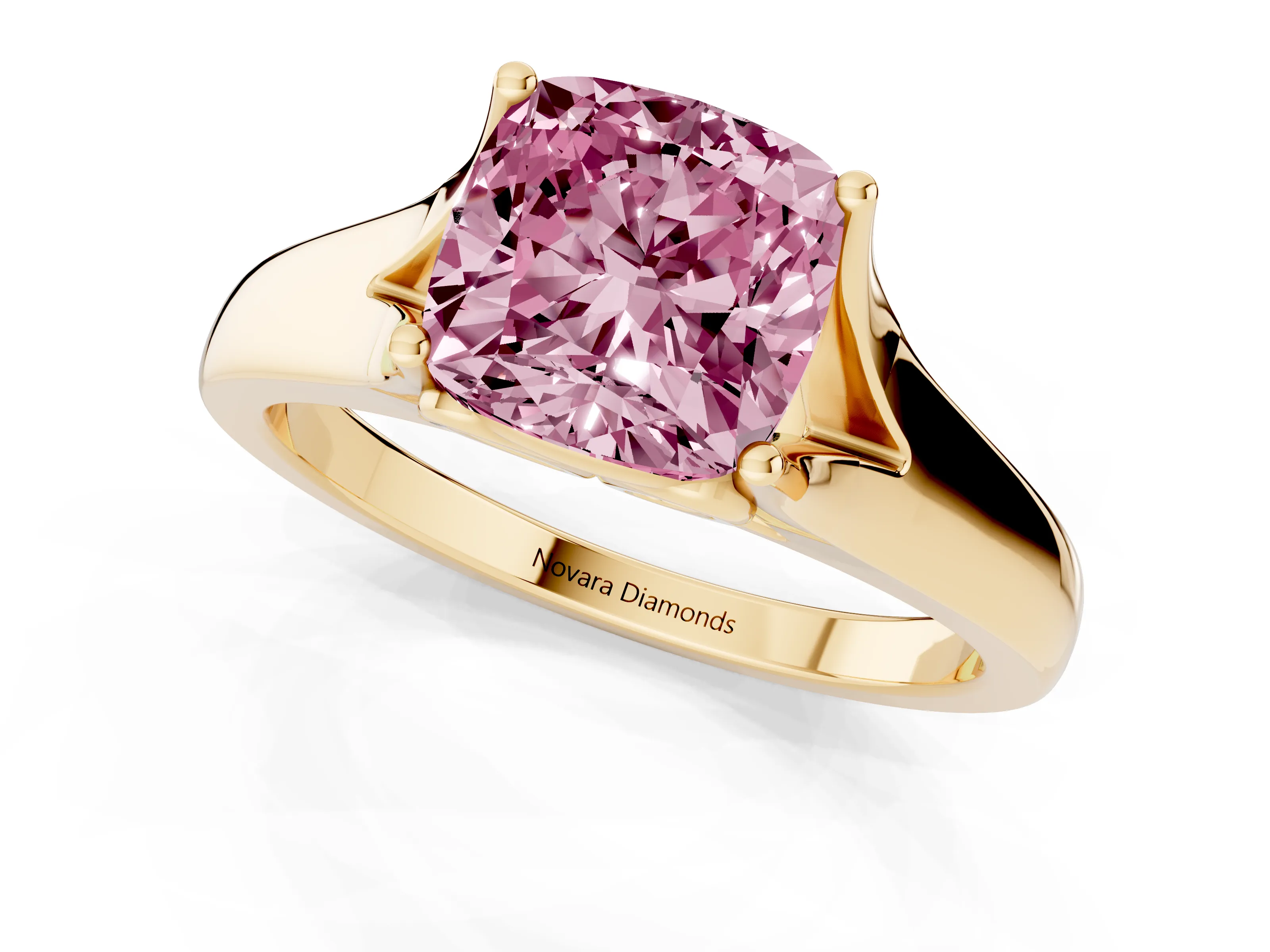 Fancy Pink Cushion Cut Diamond Solitaire Ring Set in Yellow gold with Arched Cathedral Band and Prong Setting