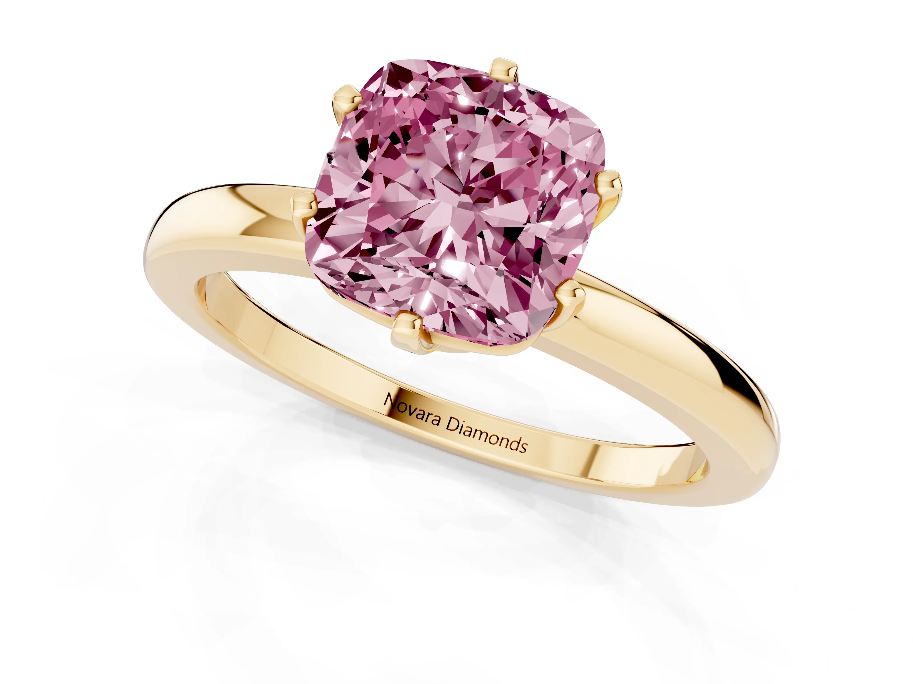Fancy Pink Cushion Cut Diamond Solitaire Ring Set in Yellow gold with Raised Prong Setting on a Classic Band