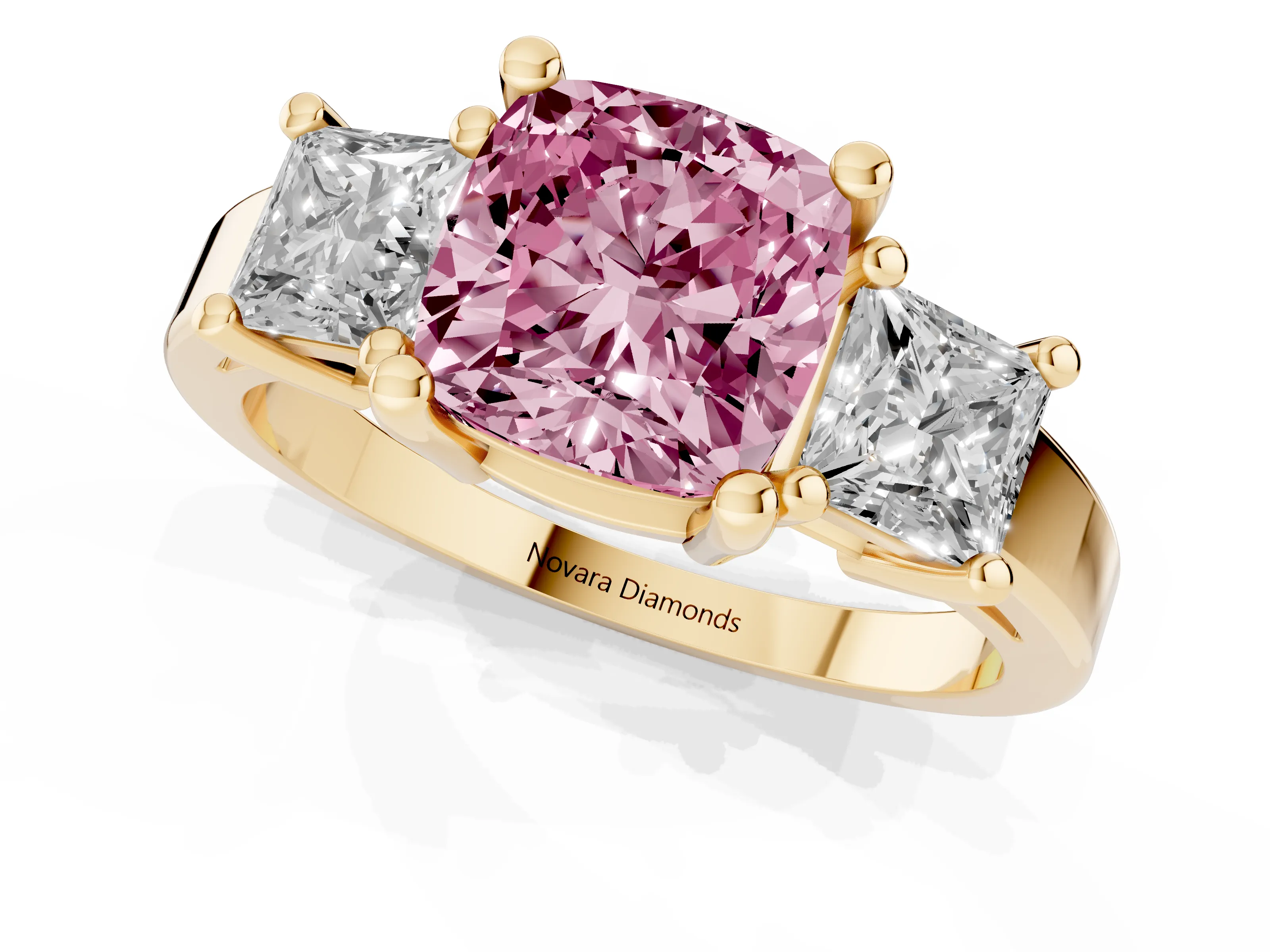 Fancy Pink Three-Stone Cushion Cut Diamond Solitaire Ring Set in Yellow gold with Prong Setting