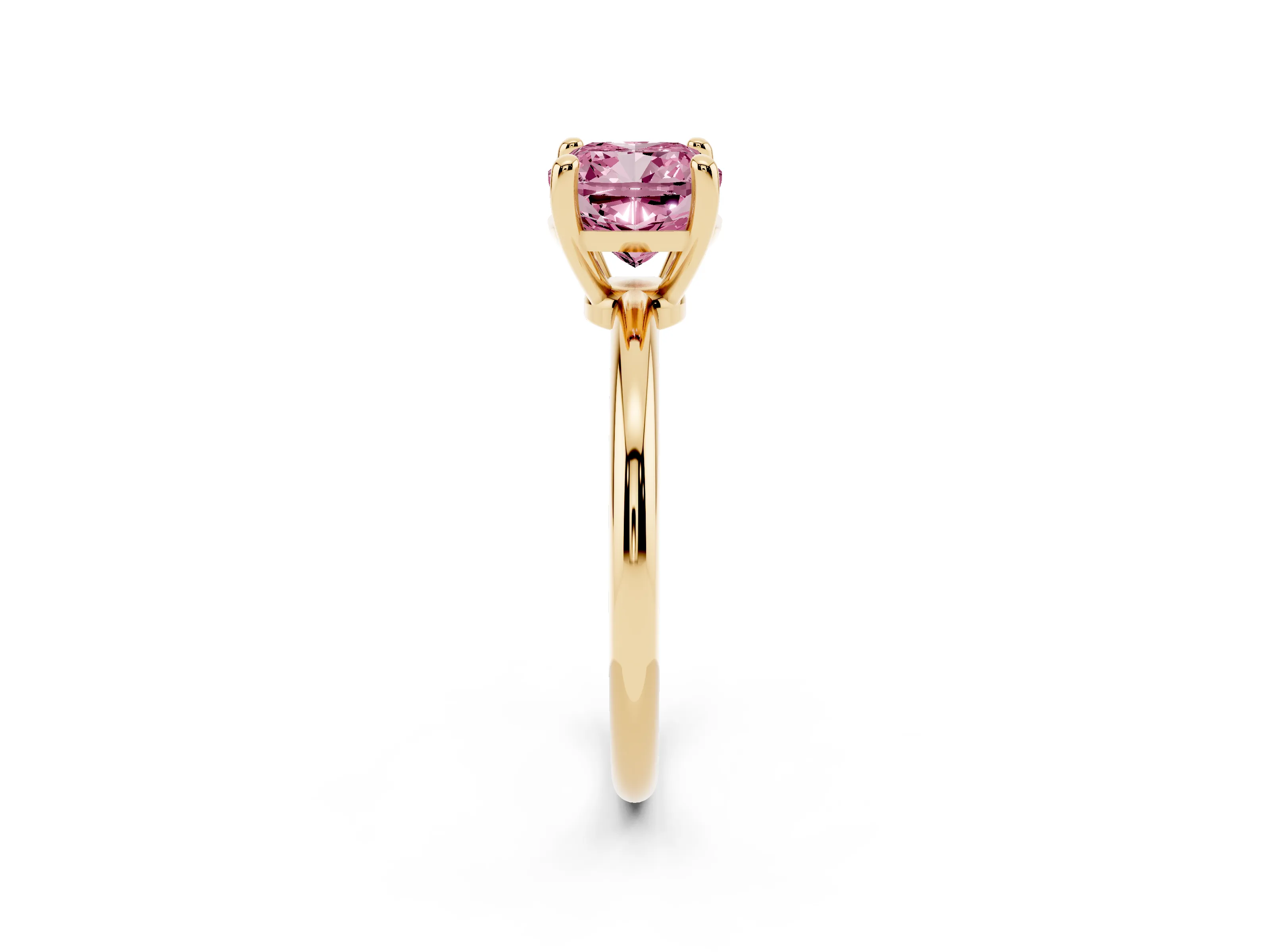 Fancy Pink Cushion Cut Diamond Solitaire Ring Set in Yellow gold with Secure Prong Setting on a Classic Band