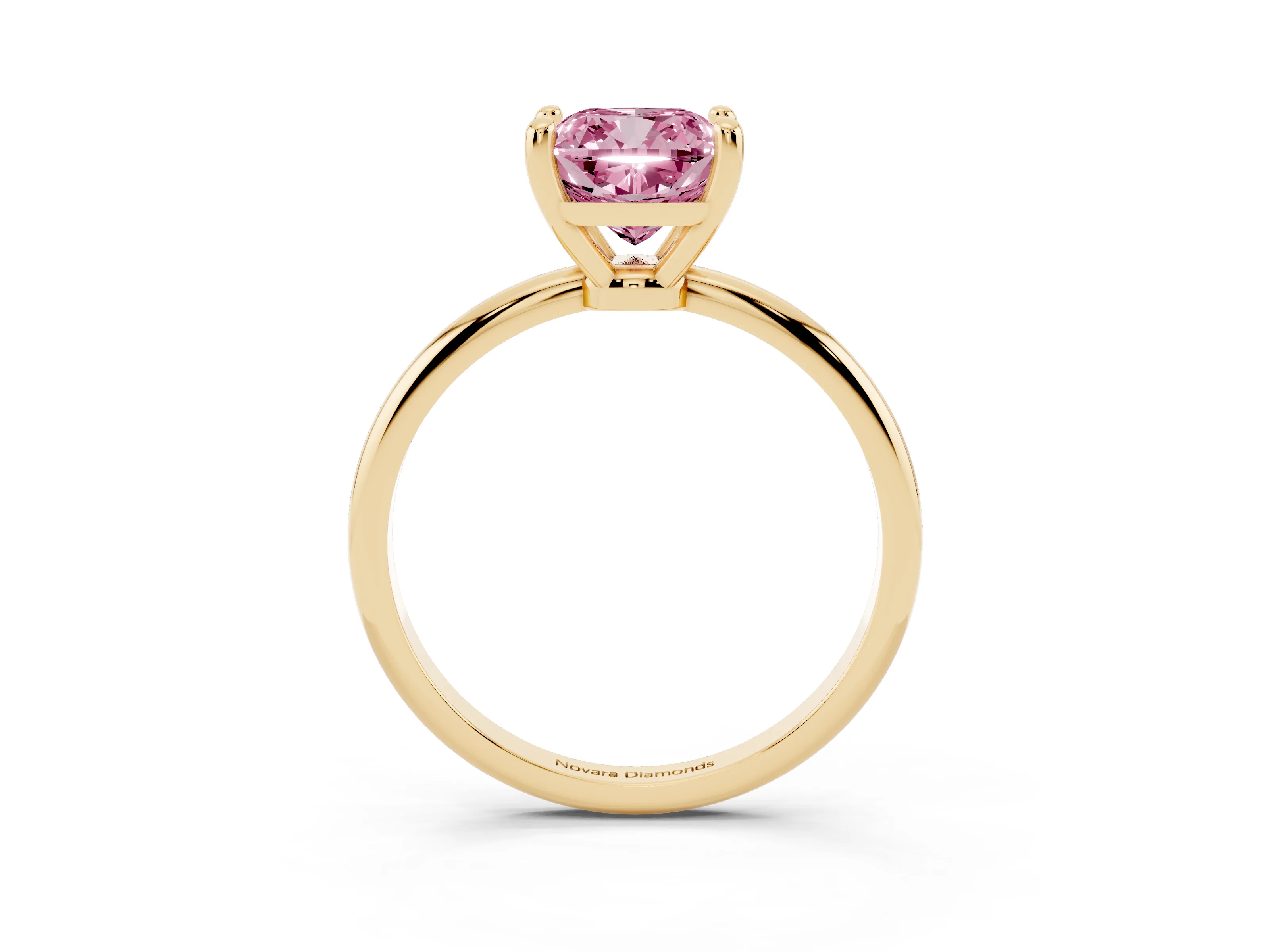 Fancy Pink Cushion Cut Diamond Solitaire Ring Set in Yellow gold with Secure Prong Setting on a Classic Band