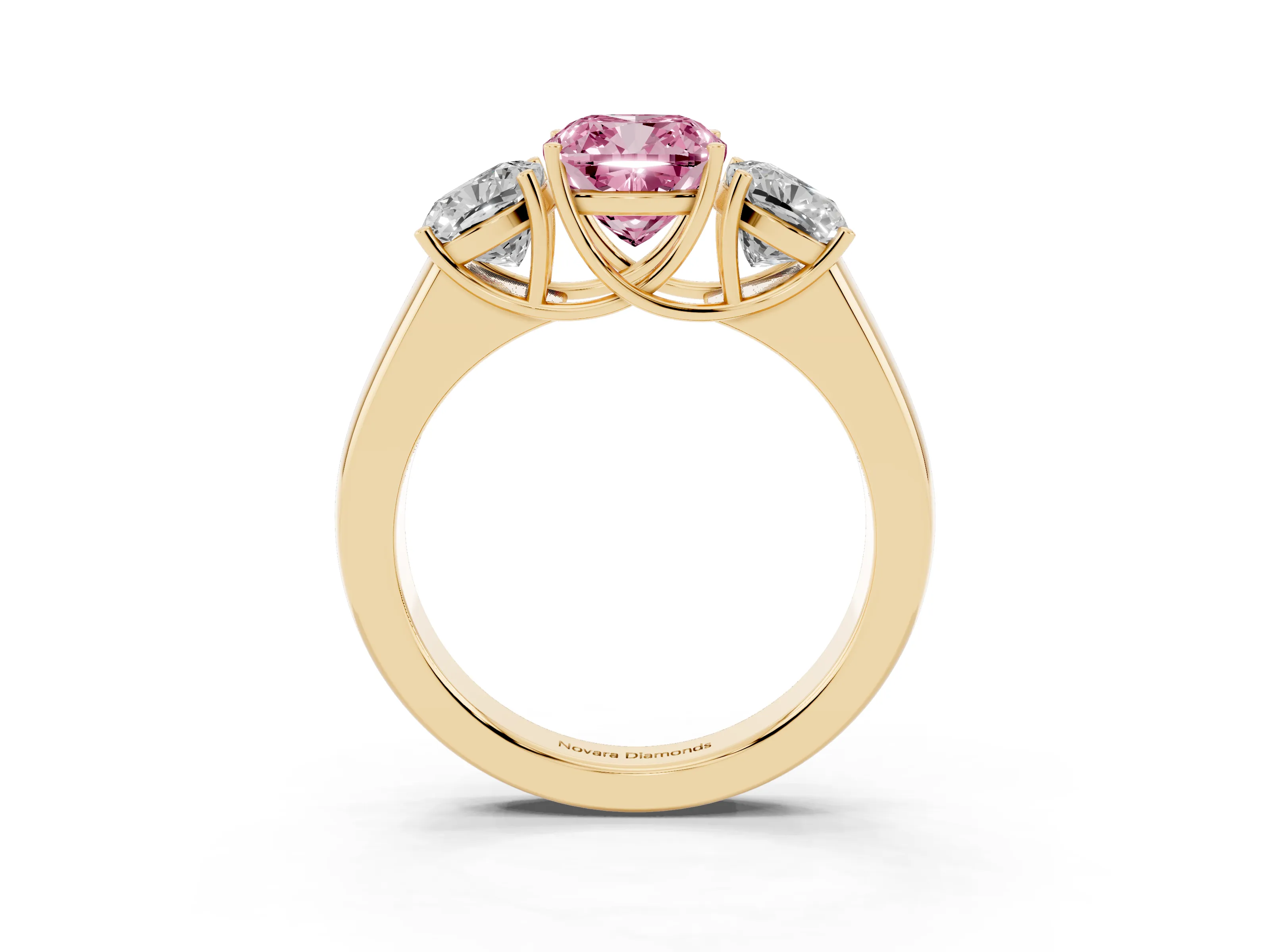 Fancy Pink Three-Stone Cushion Cut Diamond Ring Set in Yellow gold with Matching Prong Settings and Plain Band