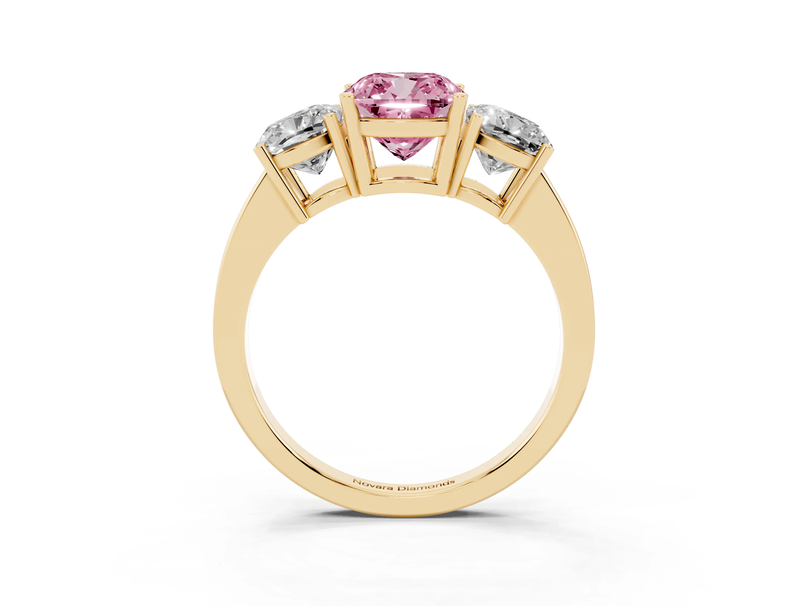 Fancy Pink Cushion Cut Diamond Three-Stone Engagement Ring Set in Yellow gold with Flat Band