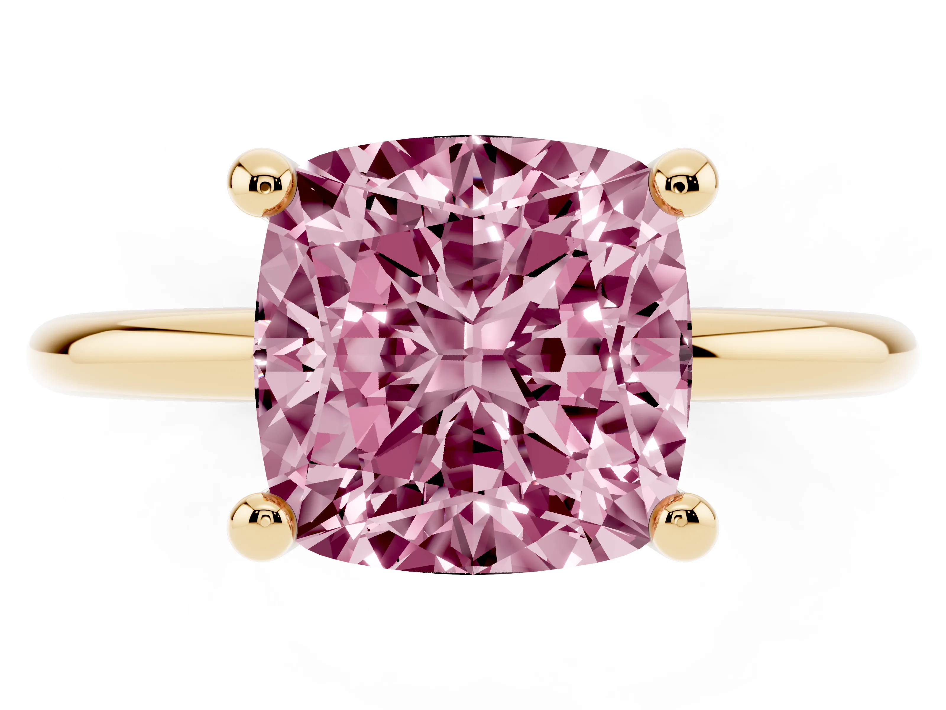 Fancy Pink Cushion Cut Diamond Solitaire Ring Set in Yellow gold with Secure Prong Setting on a Classic Band