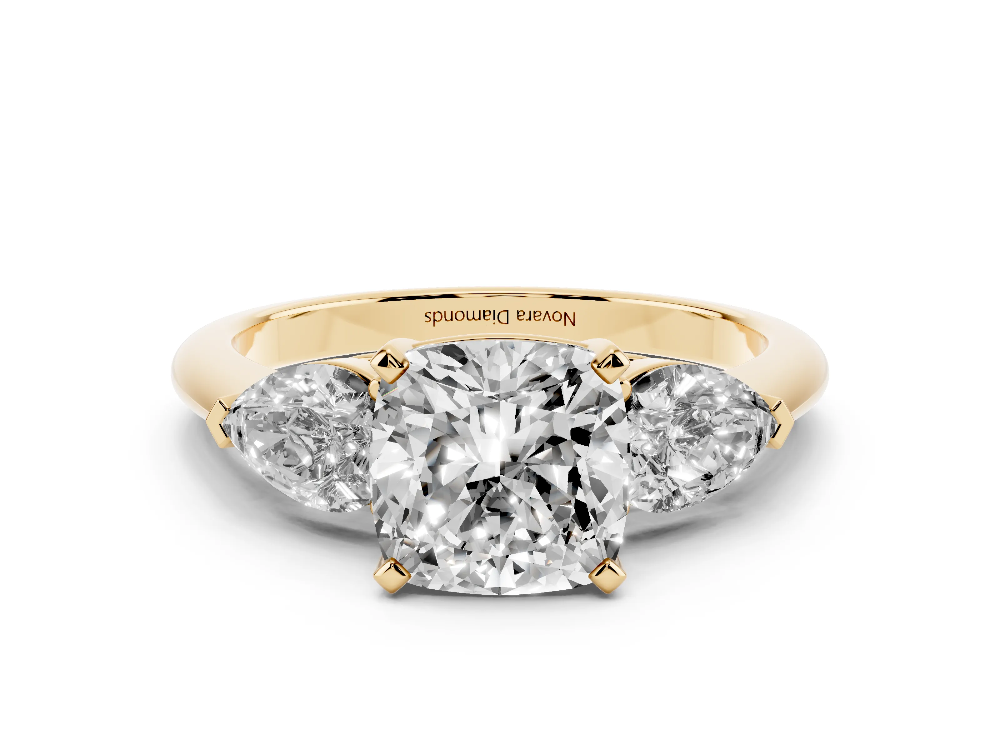 Three-Stone Cushion Cut Diamond Ring Set in Yellow gold with Pear Side Stones and Prong Setting