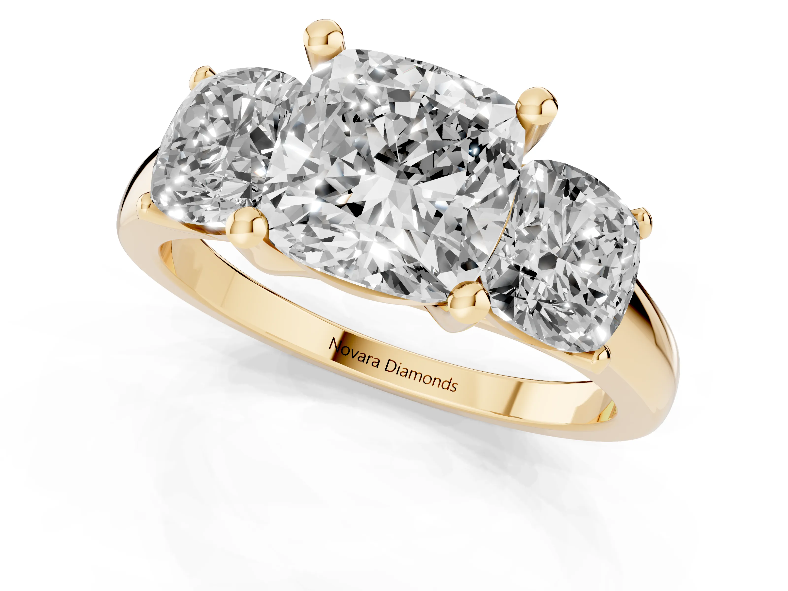 Cushion Cut Diamond Three-Stone Ring Set in Yellow gold with Classic Prong Setting and Plain Band