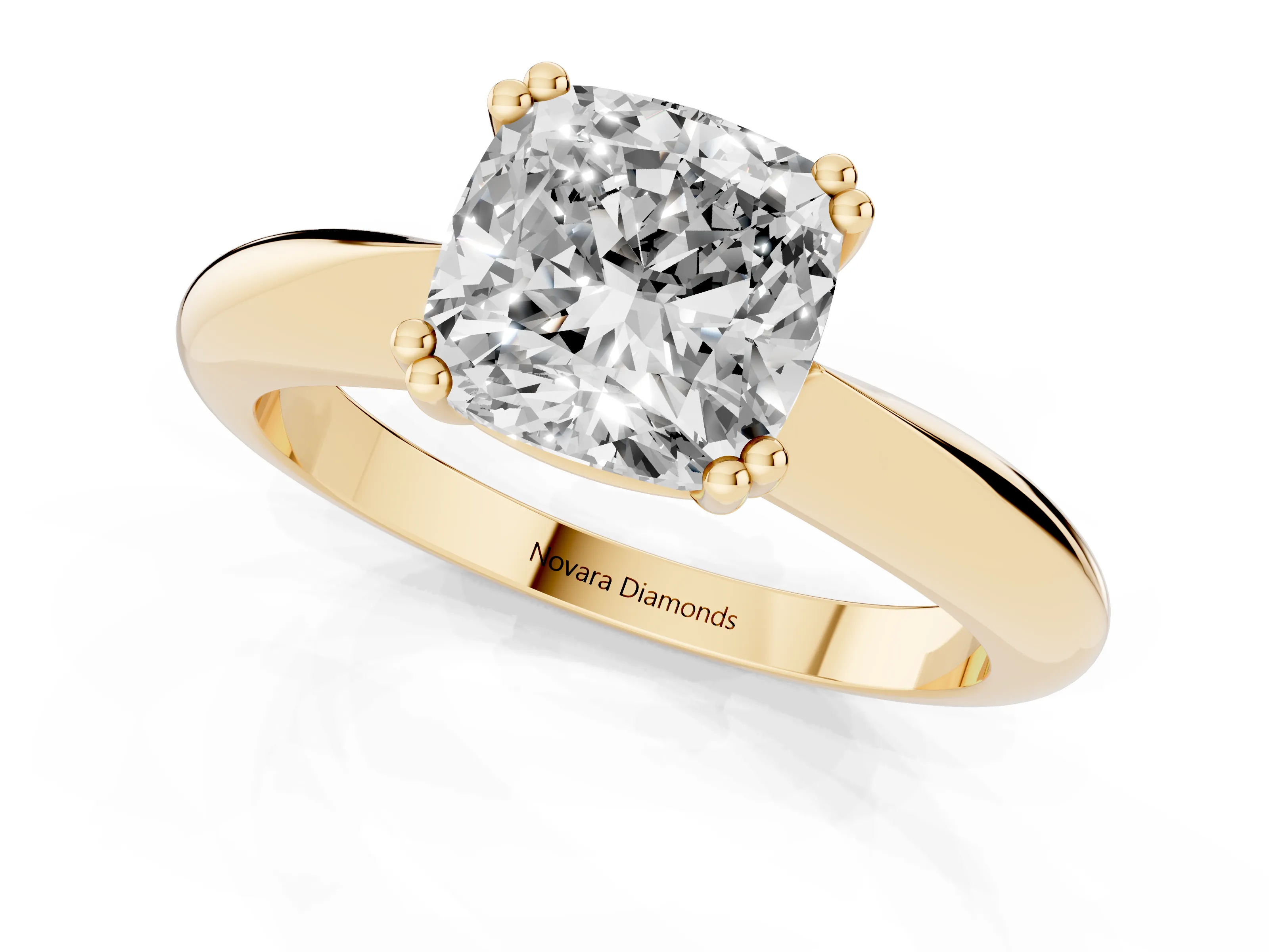 Cushion Cut Diamond Solitaire Engagement Ring Set in Yellow gold with Tapered Band and Prong Setting