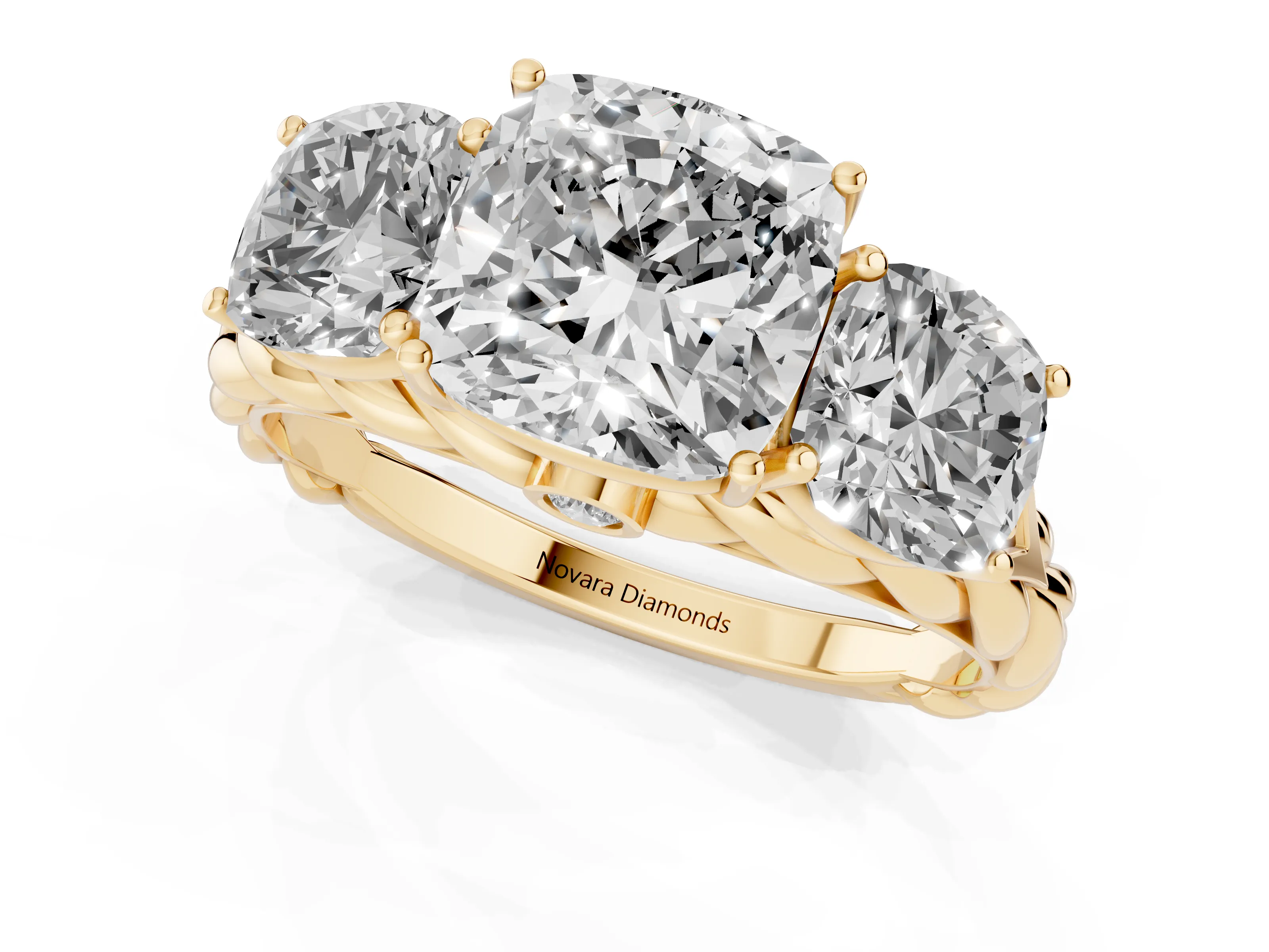Cushion Cut Diamond Three-Stone Ring Set in Yellow gold with Braided Band